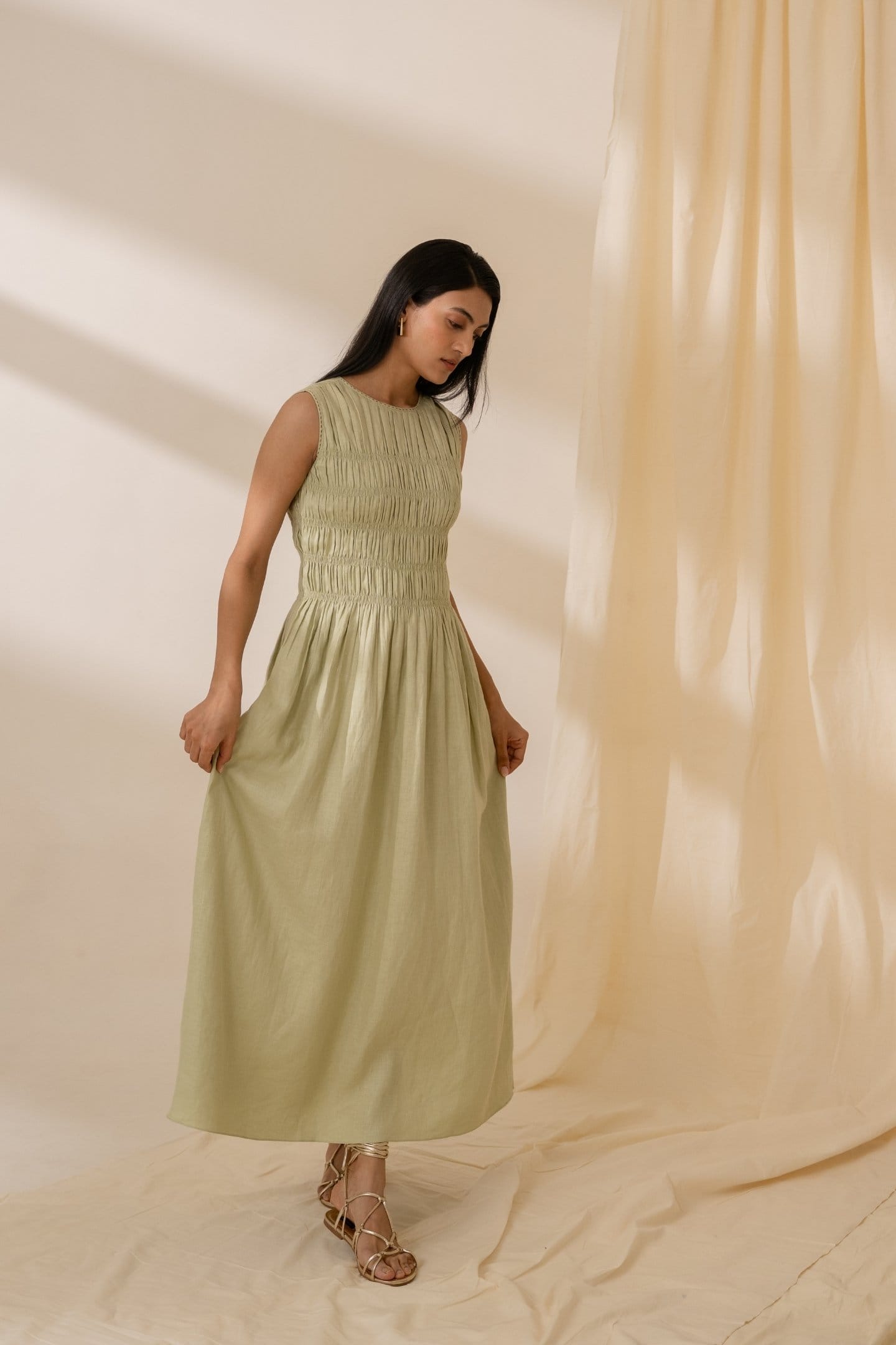 Mint green Alternative maxi smocked dress with a flowy silhouette and adjustable straps, perfect for casual or summer wear.
