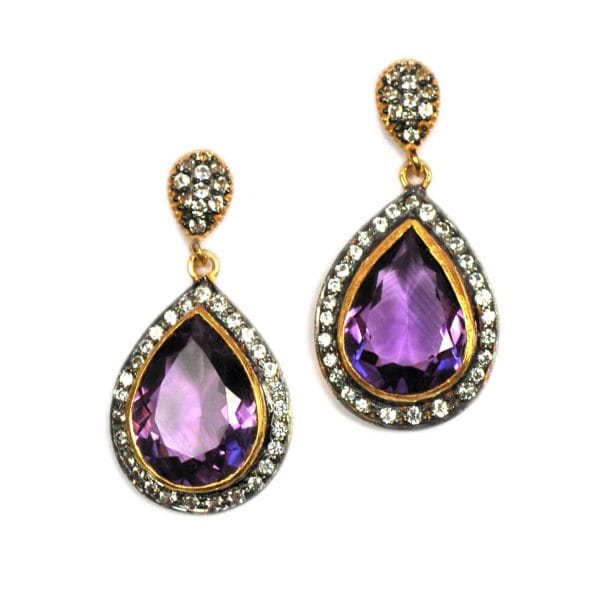 Bombaybirds Divali earrings with intricate gold and gemstone designs, showcasing traditional Indian jewelry craftsmanship.