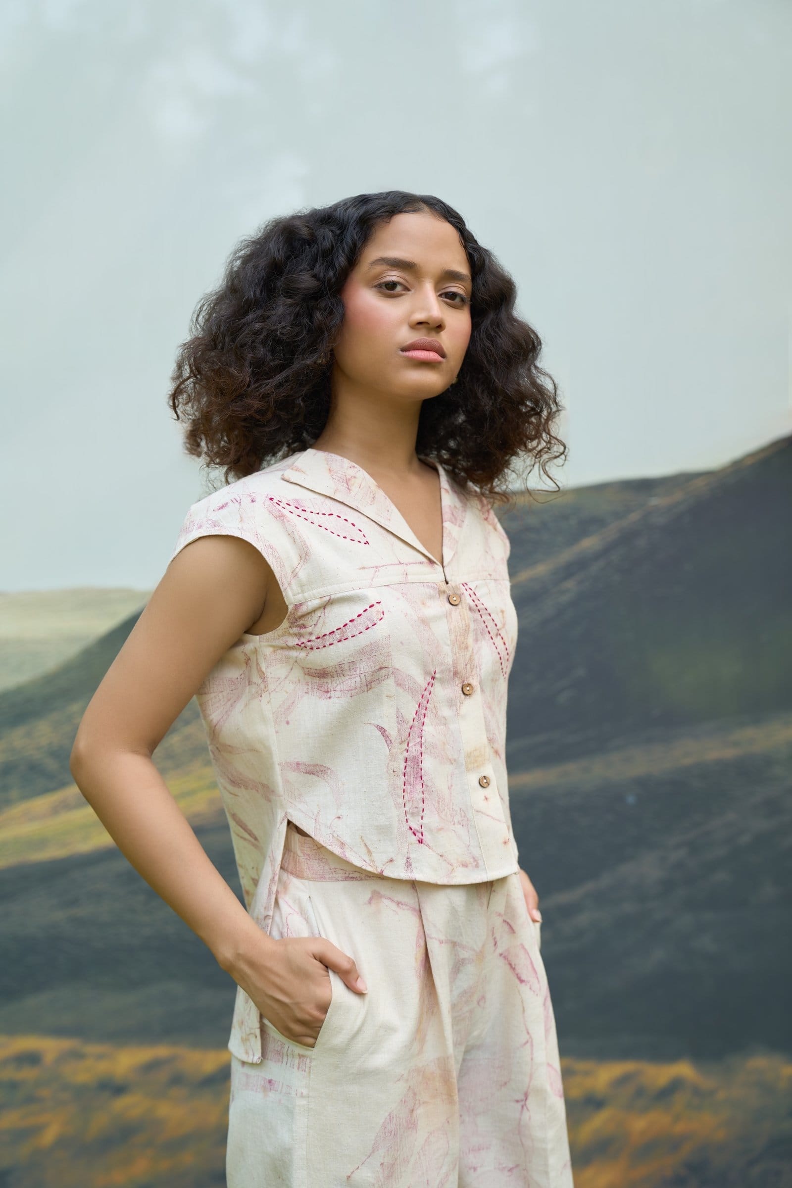 Pink foliage straight trousers by Alternative, featuring vibrant botanical print and a tailored fit for a stylish look.