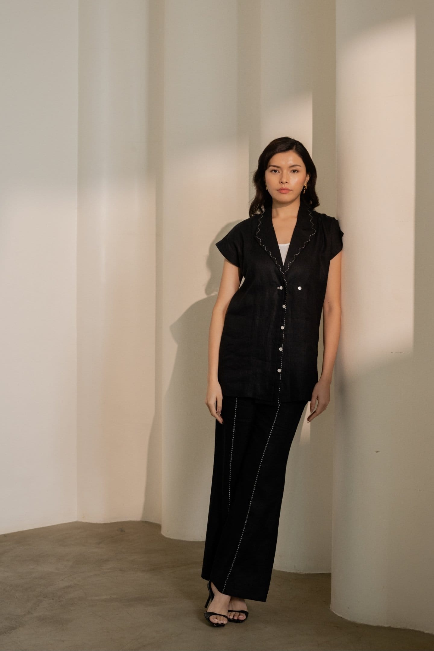 Ebony black hemp trousers by Alternative, featuring a relaxed fit with a high waist and straight-leg style.