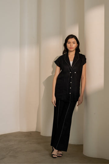 Ebony black hemp trousers by Alternative, featuring a relaxed fit with a high waist and straight-leg style.