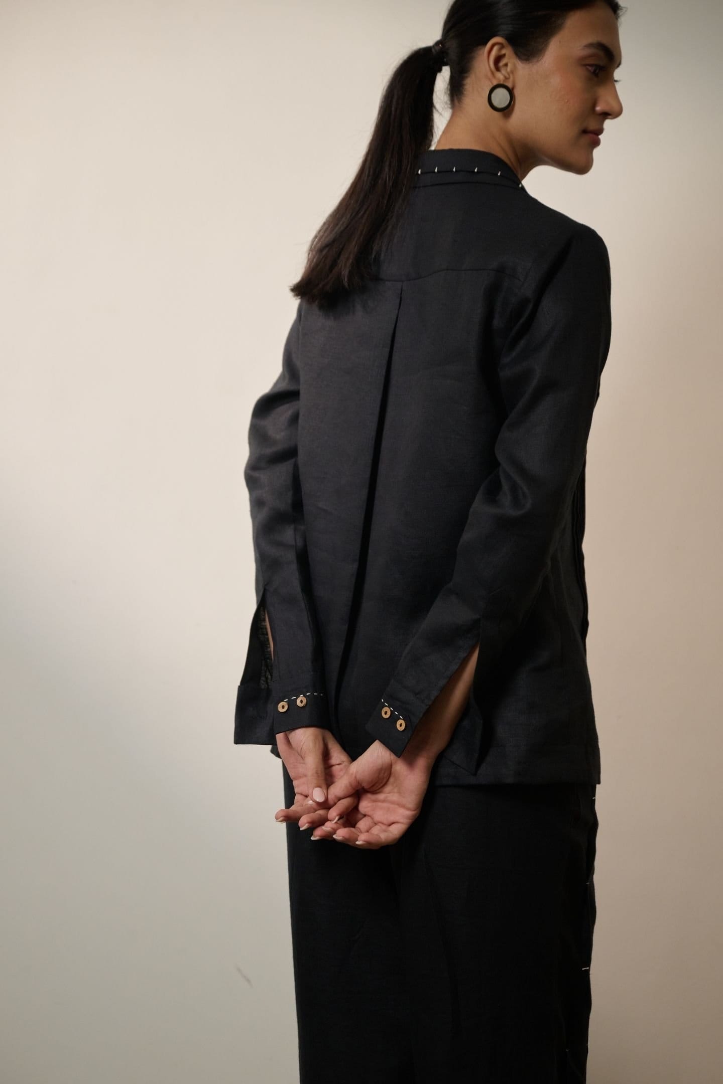 Ebony black hemp pintucks shirt by Alternative, a stylish women's top with pintuck details and a relaxed fit.