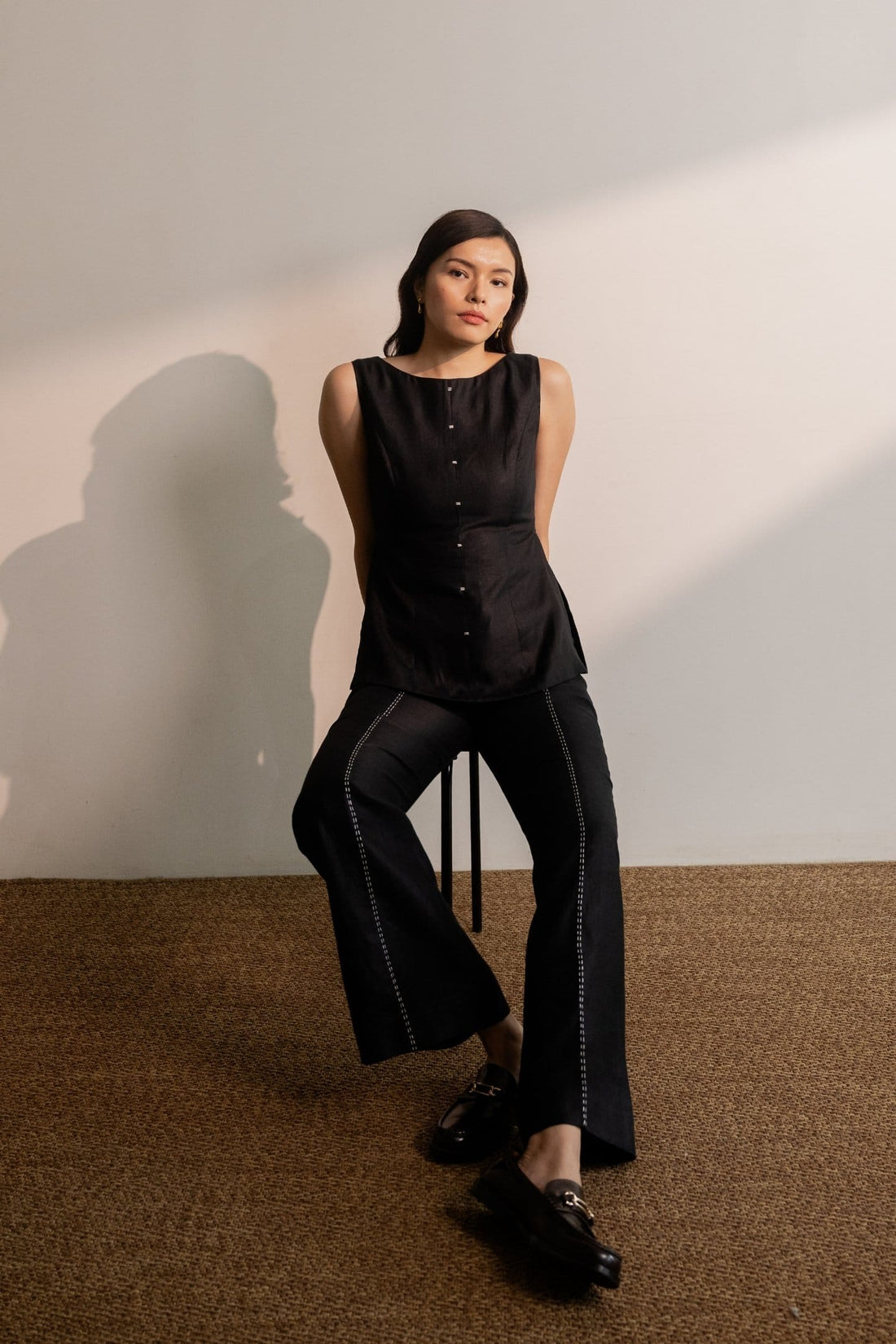Ebony black sleeveless hemp top from Alternative featuring a relaxed fit and casual style, displayed on a plain background.