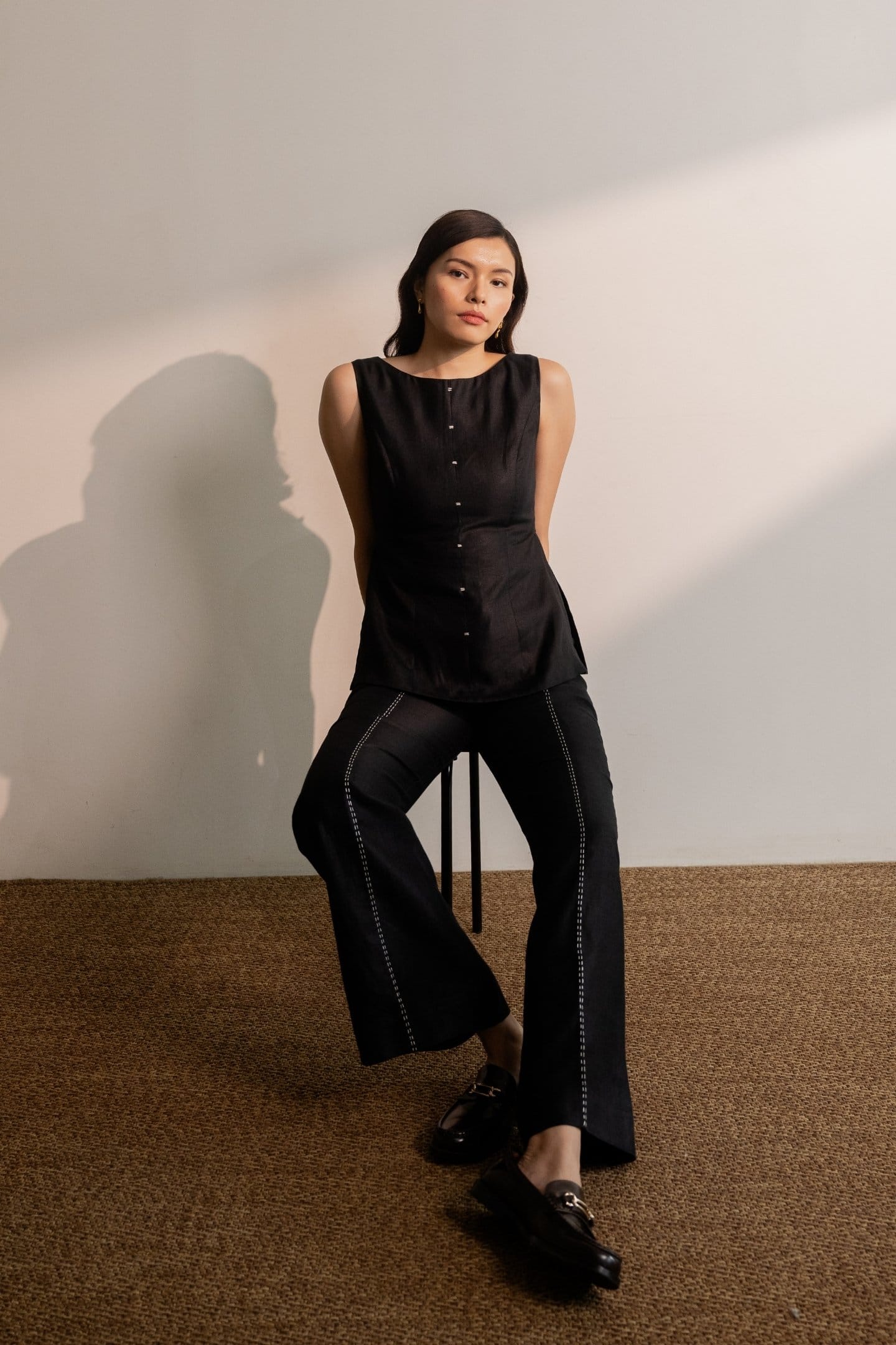 Ebony black sleeveless hemp top by Alternative, featuring a casual sleeveless design with a relaxed fit.