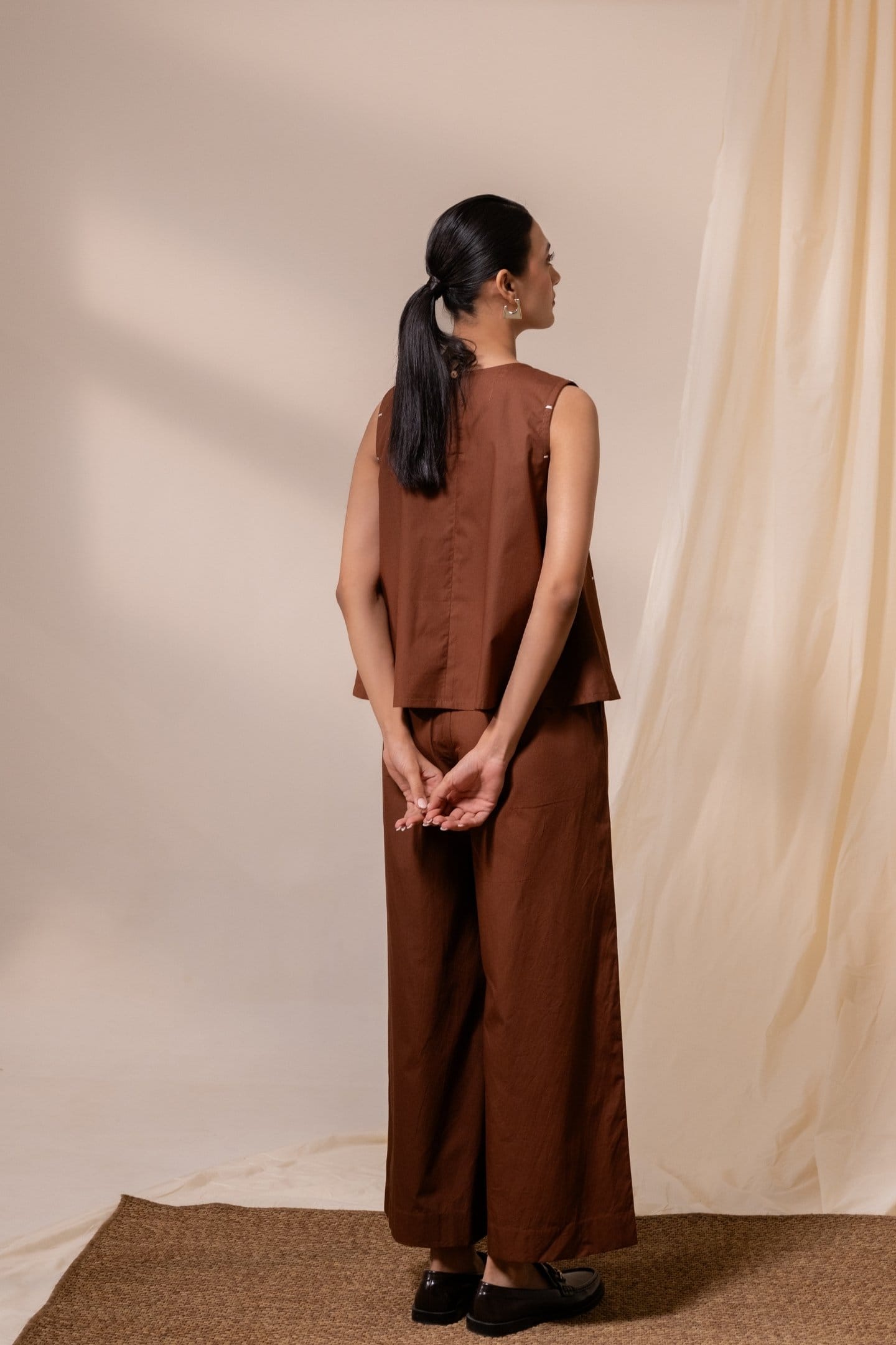 Alternative Ether brown sleeveless top paired with matching pants, casual sleeveless top for stylish everyday wear.