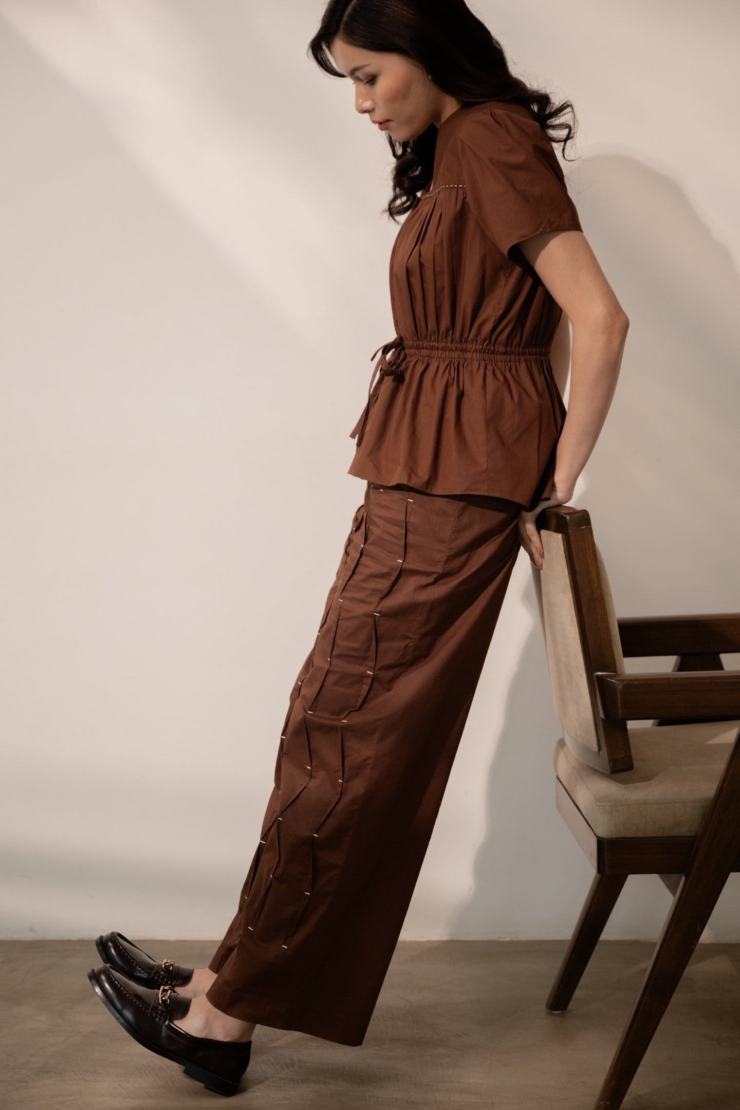 Alternative Ether brown tie-up top paired with matching pants, stylish casual blouse with adjustable tie front and comfortable fit.