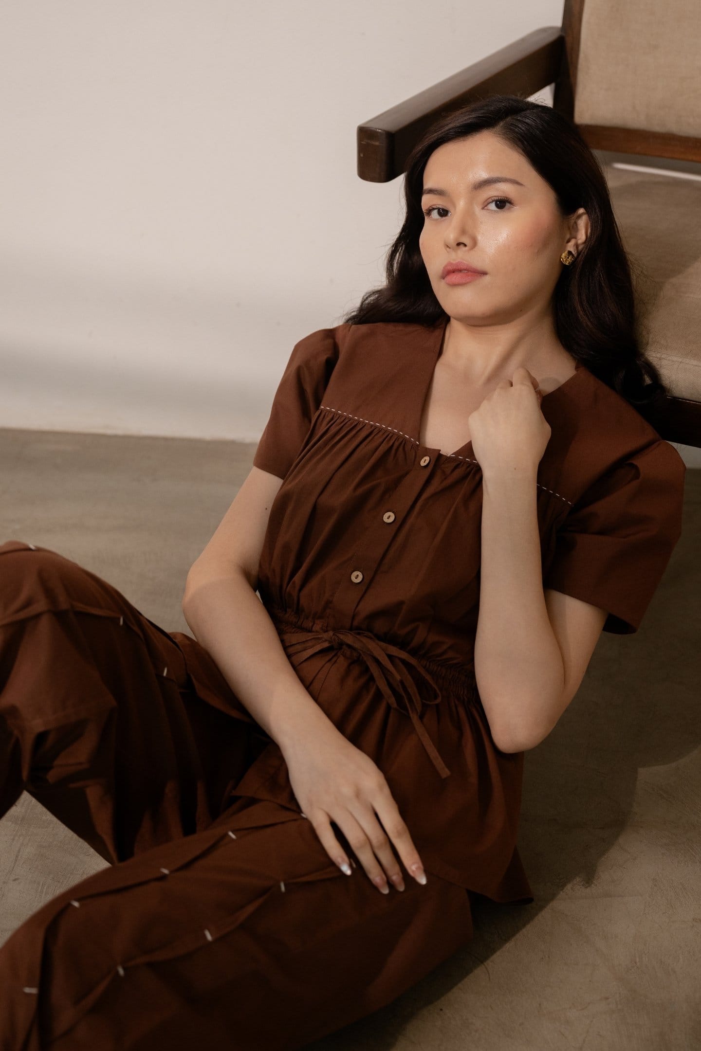 Alternative Ether brown tie-up top paired with pants, featuring a stylish, casual design with adjustable front ties and comfortable fit.