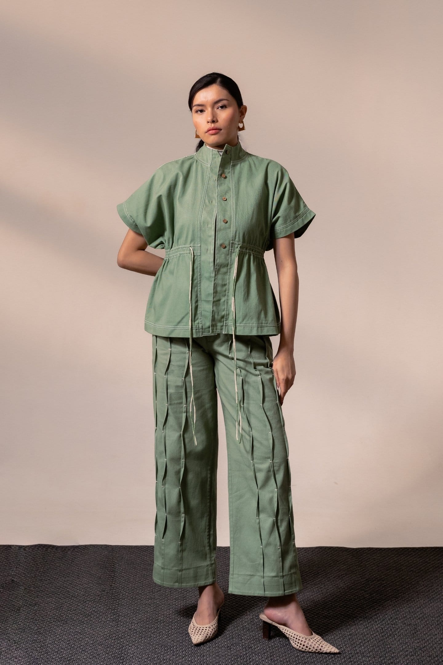Fern green denim top from Alternative, stylish casual top with a relaxed fit and button details.