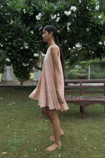 Alternative Petals Please Dress, short floral dress with ruffled details, displayed on a hanger against a neutral background.