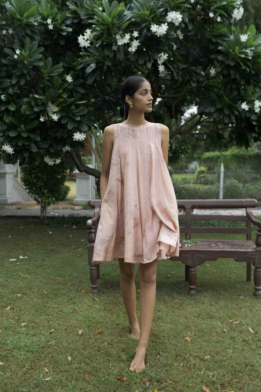 Alternative Petals Please Dress, short floral dress with ruffled details, displayed on a hanger against a neutral background.