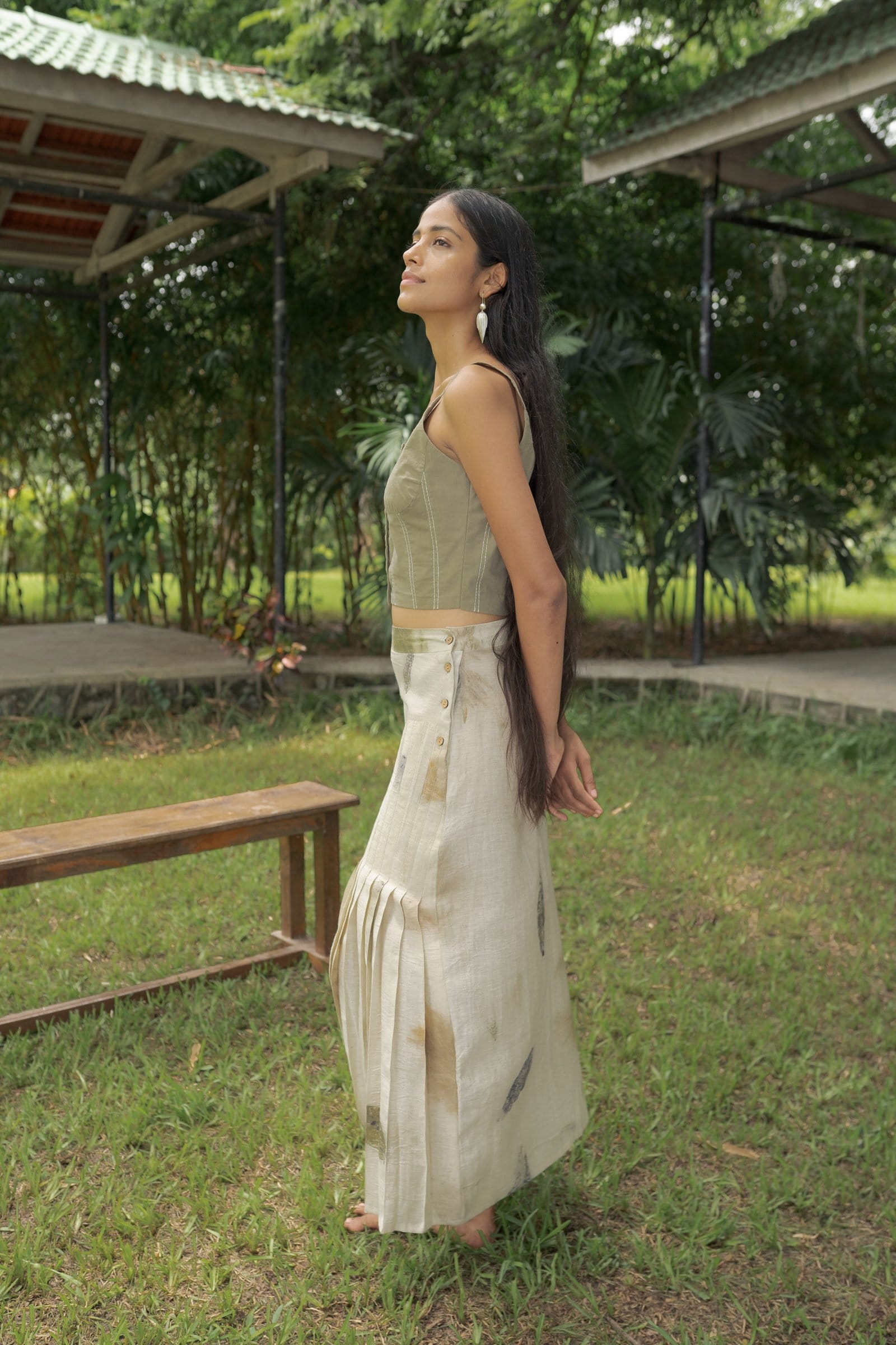 Alternative live leafy vest, a stylish green leafy top with a sleeveless design, displayed on a neutral background.