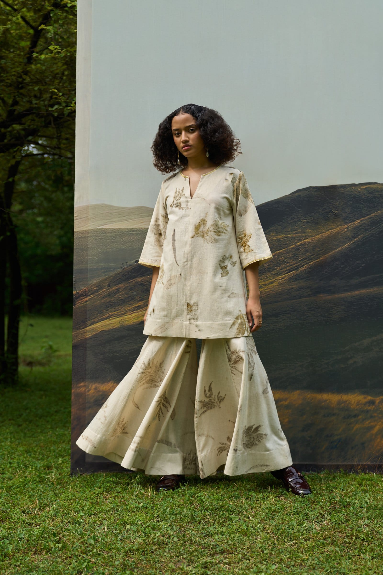 Alternative live leafy kurta, a stylish top featuring a vibrant leafy pattern, perfect for casual or semi-formal wear.