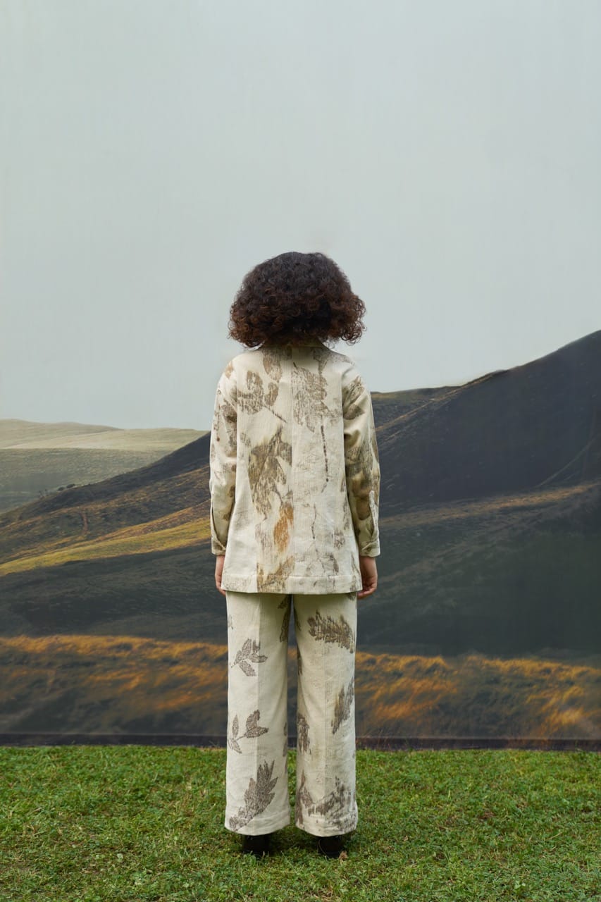 Alternative Grove corduroy overlay jacket with a relaxed fit and button closure, shown in a neutral color.