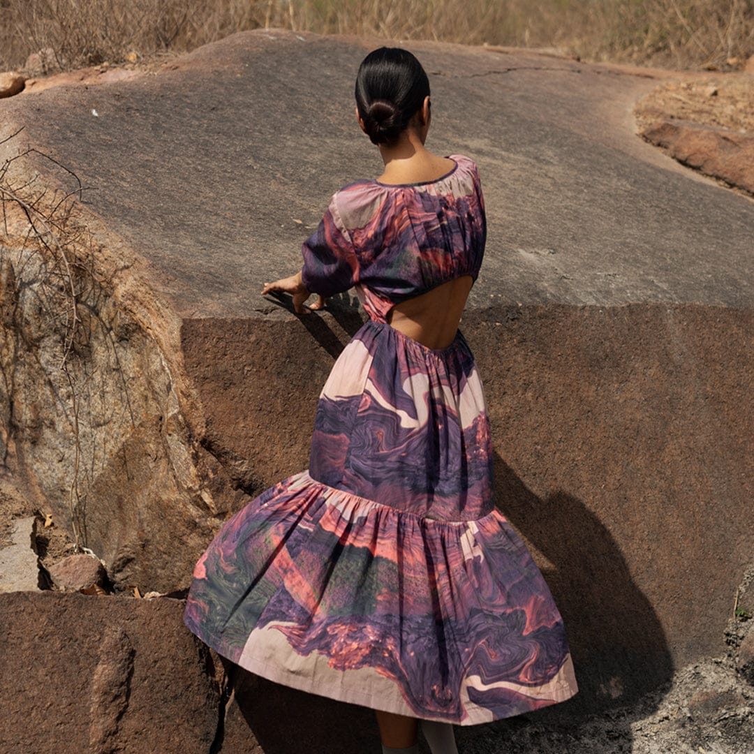 Amin printed dress from Doodlage featuring colorful patterns and a flowing silhouette, perfect for casual or semi-formal wear.