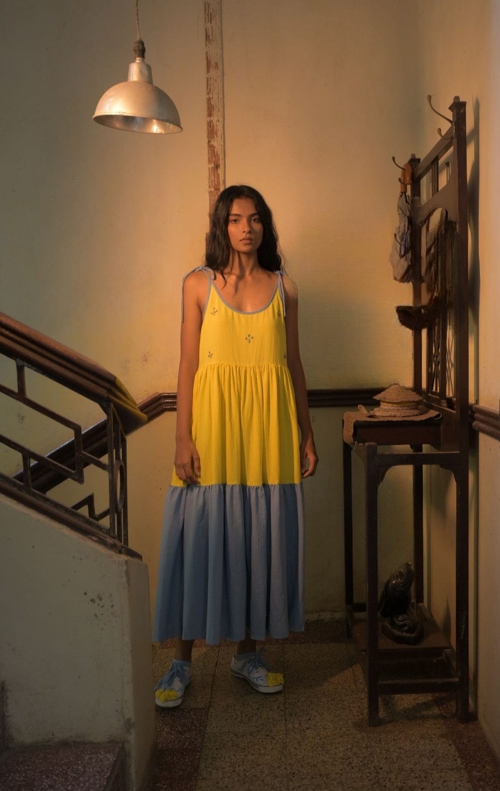 Deeta Kira slip dress in soft fabric, featuring a sleek silhouette and delicate straps, perfect for stylish everyday wear.