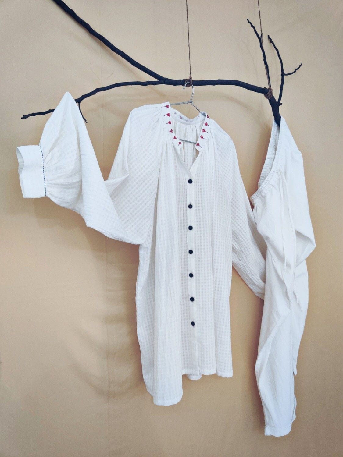 Deeta classic white co-ord set featuring a stylish crop top and high-waisted pants, perfect for casual or chic looks.