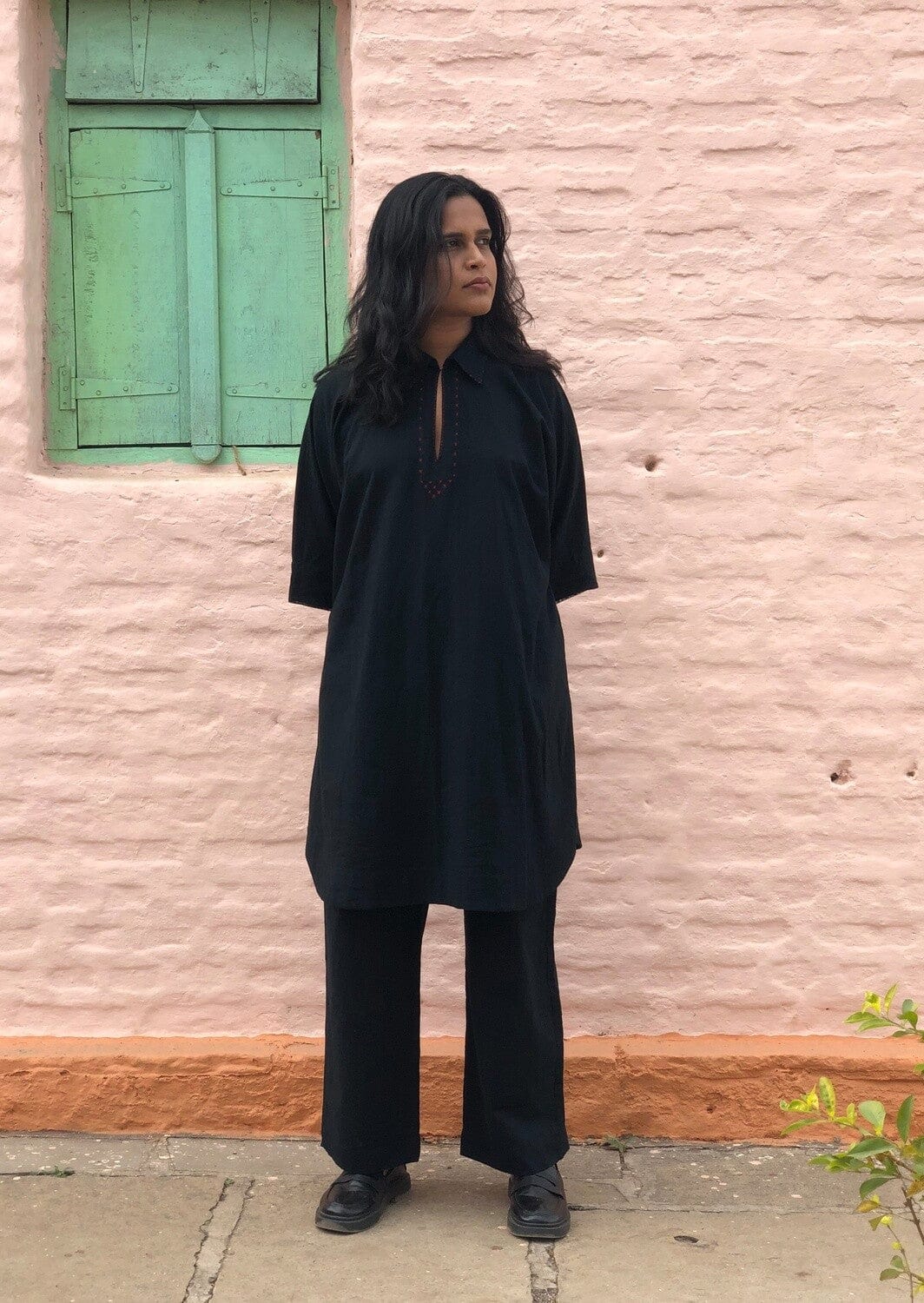 Deeta Kuro co-ord set featuring a matching top and pants in a stylish, modern design, worn by a model.