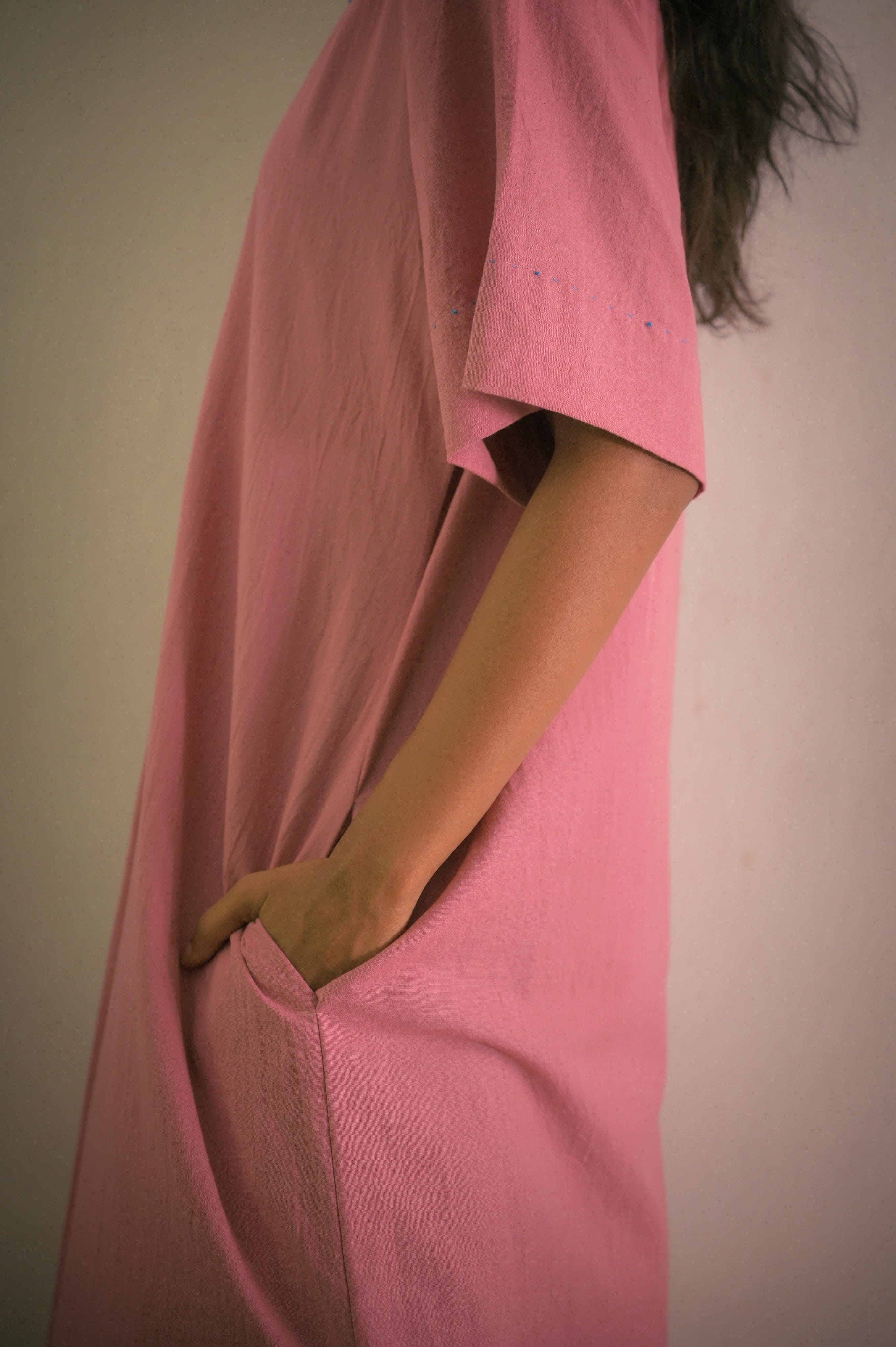 Deeta Rosa dress, elegant floral dress with flowing fabric and delicate details, perfect for casual or semi-formal occasions.