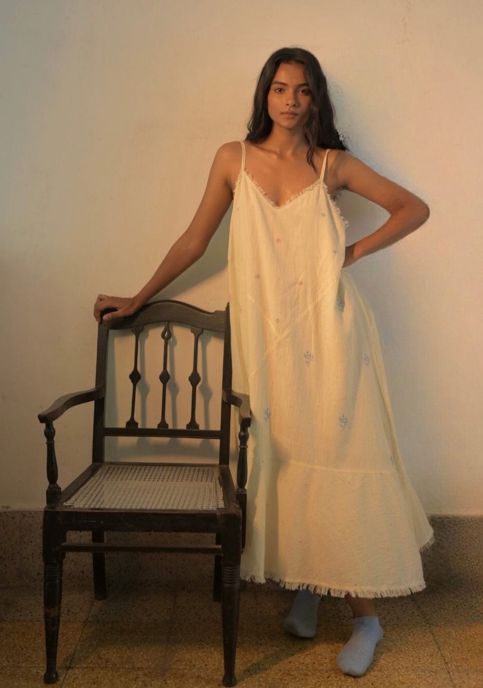 Deeta Hana slip dress featuring lightweight fabric, adjustable straps, and a sleek, minimalist design for casual or evening wear.