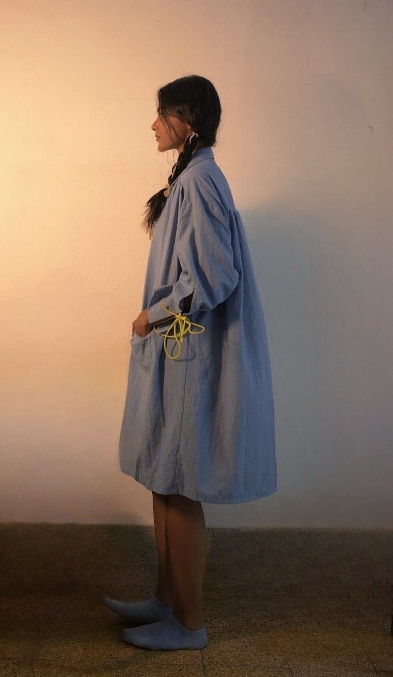 Deeta Mavi shirt dress featuring a relaxed fit, button-down front, and short sleeves, styled with a casual, everyday look.