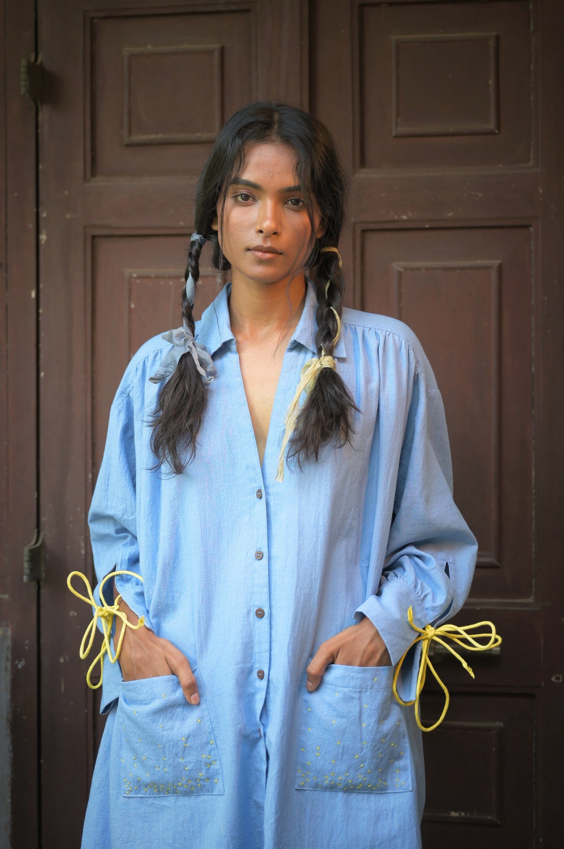 Deeta Mavi shirt dress, casual long-sleeve dress with collar and button-front, made from lightweight fabric, displayed on a hanger.