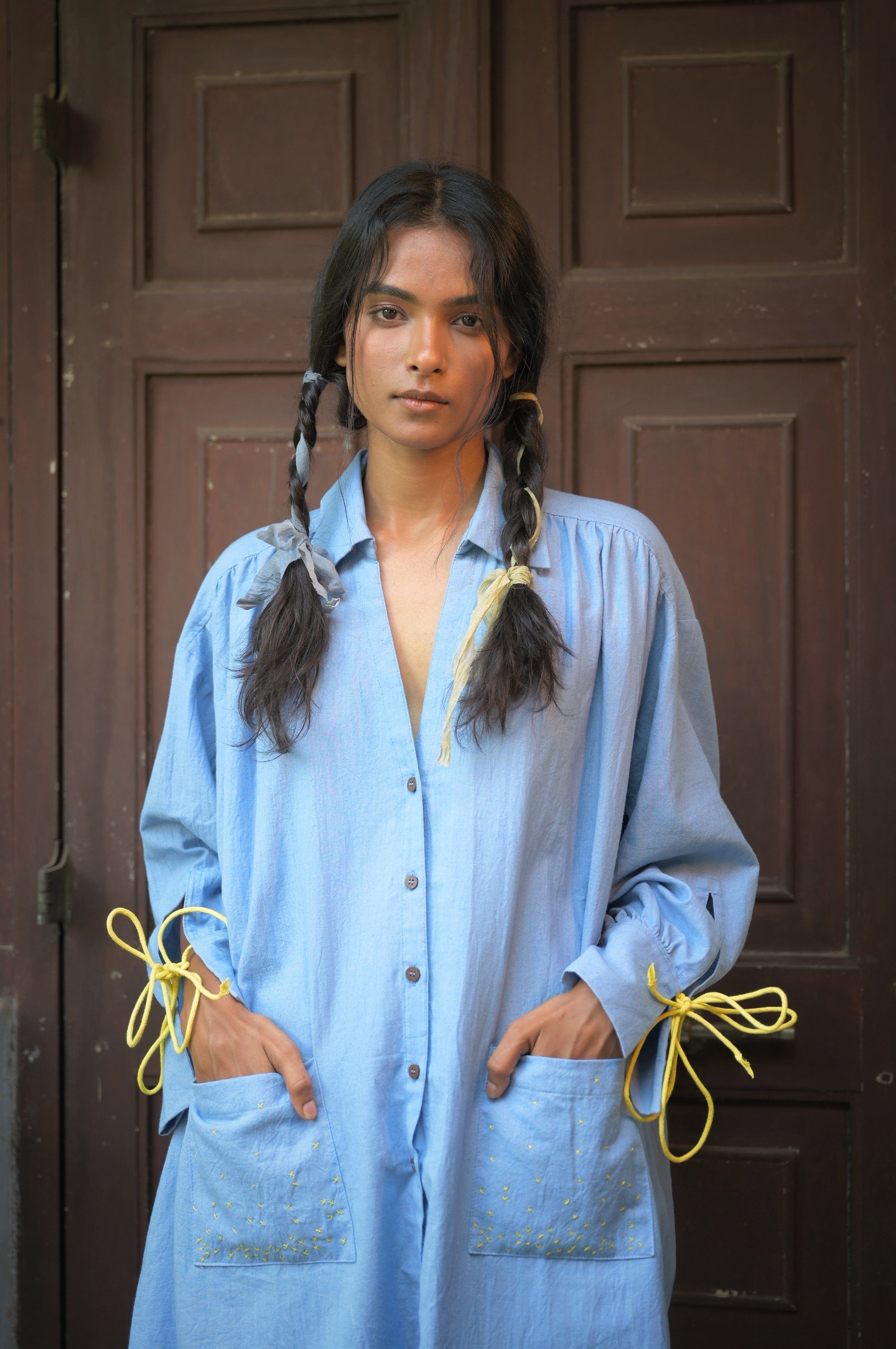 Deeta Mavi shirt dress, casual long-sleeve dress with collar and button-front, made from lightweight fabric, displayed on a hanger.