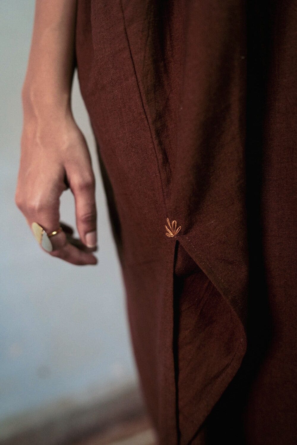 Deeta Chairo kaftan dress in flowing fabric with intricate patterns, showcasing its elegant, relaxed fit and vibrant design.