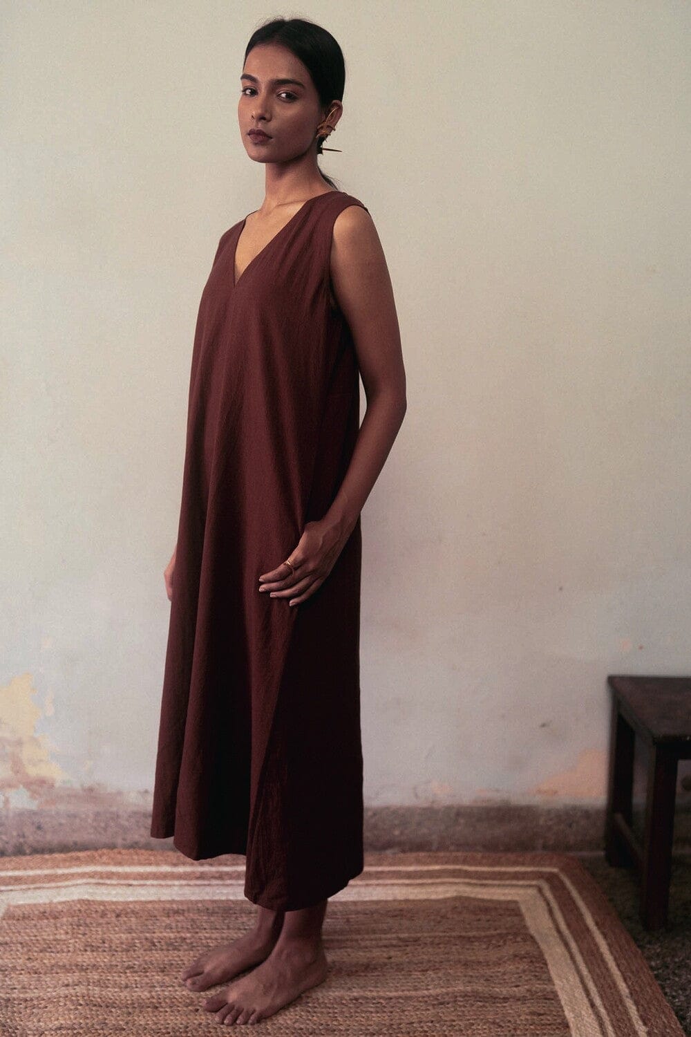 Deeta clay dress featuring a flowing, elegant design with earthy tones and a relaxed fit, perfect for casual or semi-formal occasions.