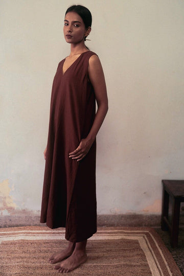 Deeta clay dress featuring a flowing, elegant design with earthy tones and a relaxed fit, perfect for casual or semi-formal occasions.