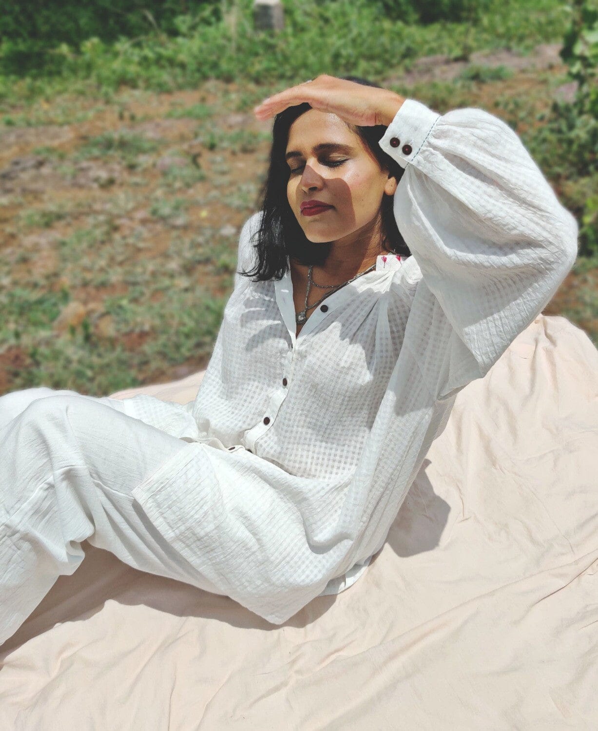 Deeta classic white co-ord set featuring a matching top and pants, stylish and comfortable for casual wear.