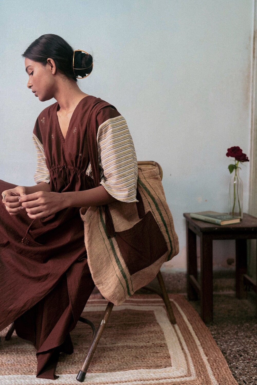 Deeta Chairo kaftan dress featuring flowing fabric and intricate patterns, perfect for elegant and comfortable wear.