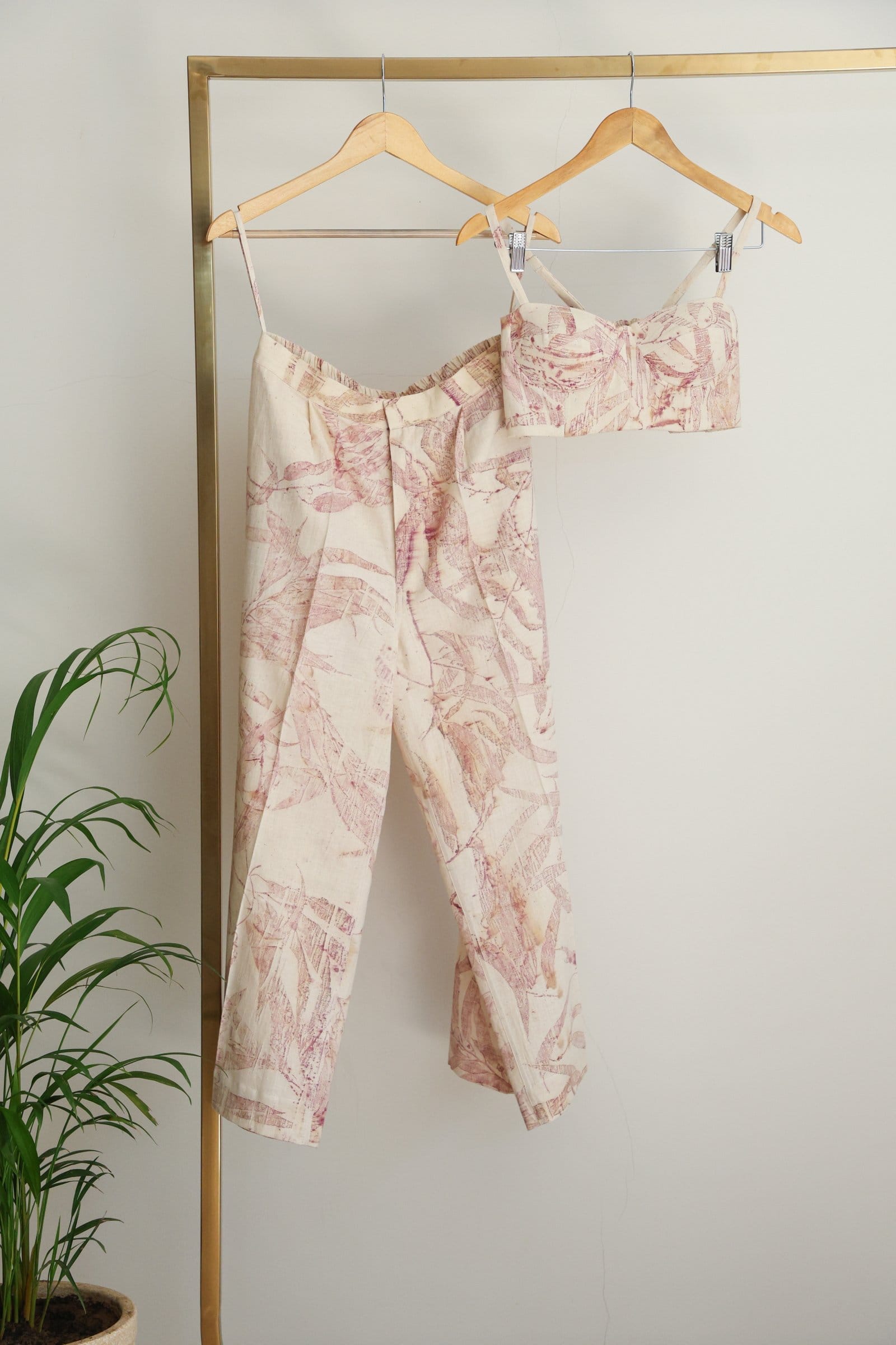 Pink foliage Alternative 3-piece coord set featuring a bralette with pink leaf patterns and matching pieces.
