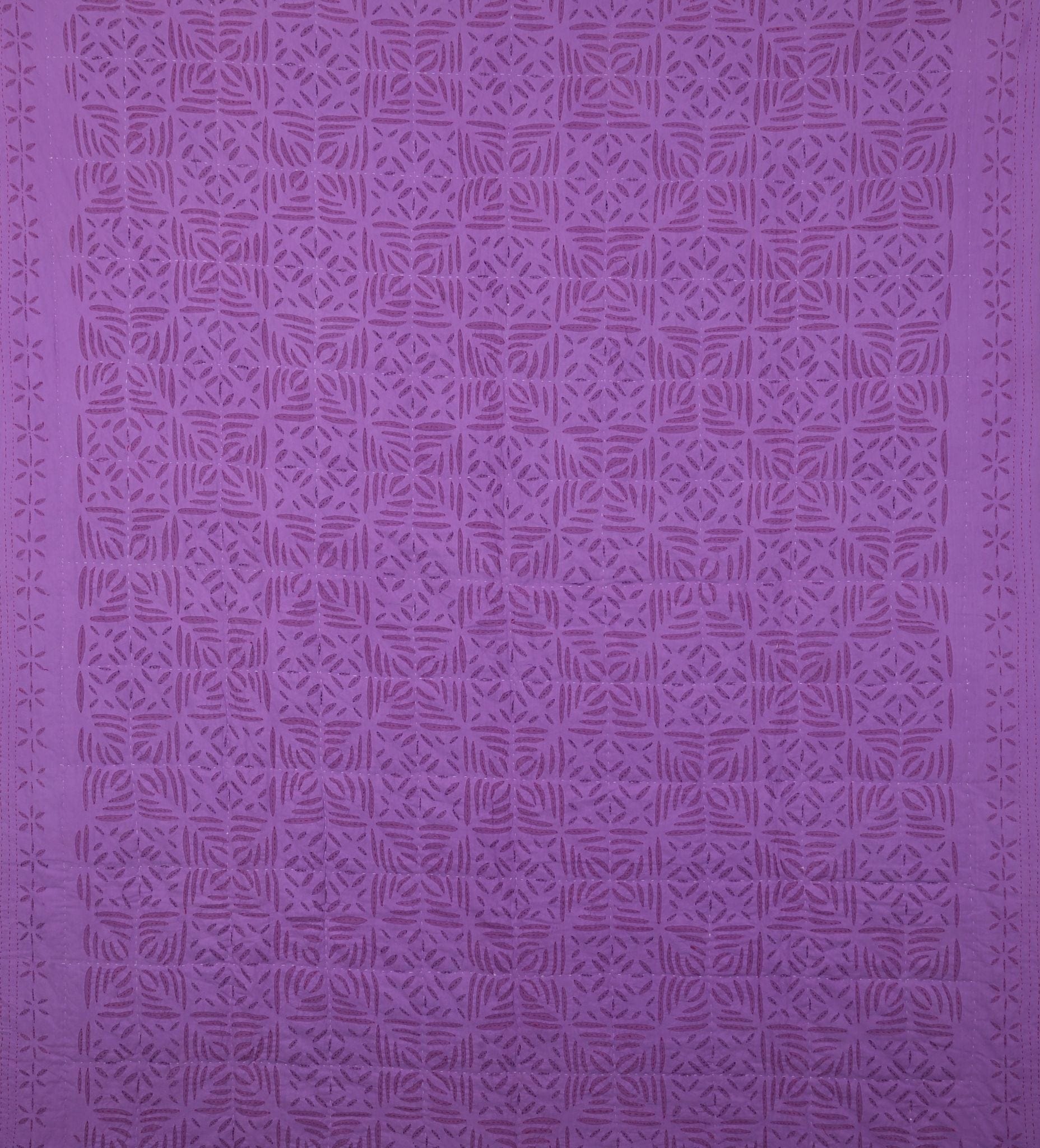 Violet quilt applique from Bombaybirds, textured cotton living room decor with intricate design and soft fabric.