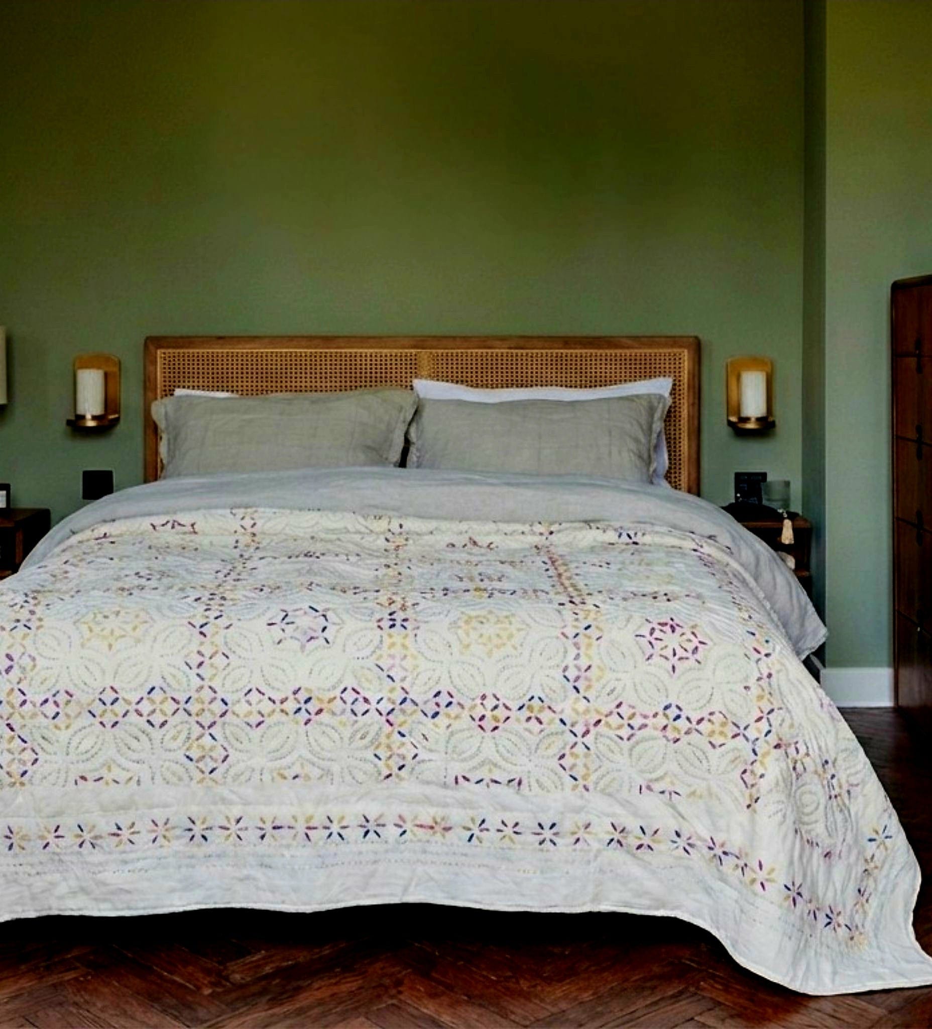 Kutch rainbow quilt by Bombaybirds, colorful cotton living quilt with vibrant rainbow pattern, perfect for luxurious interior decor.