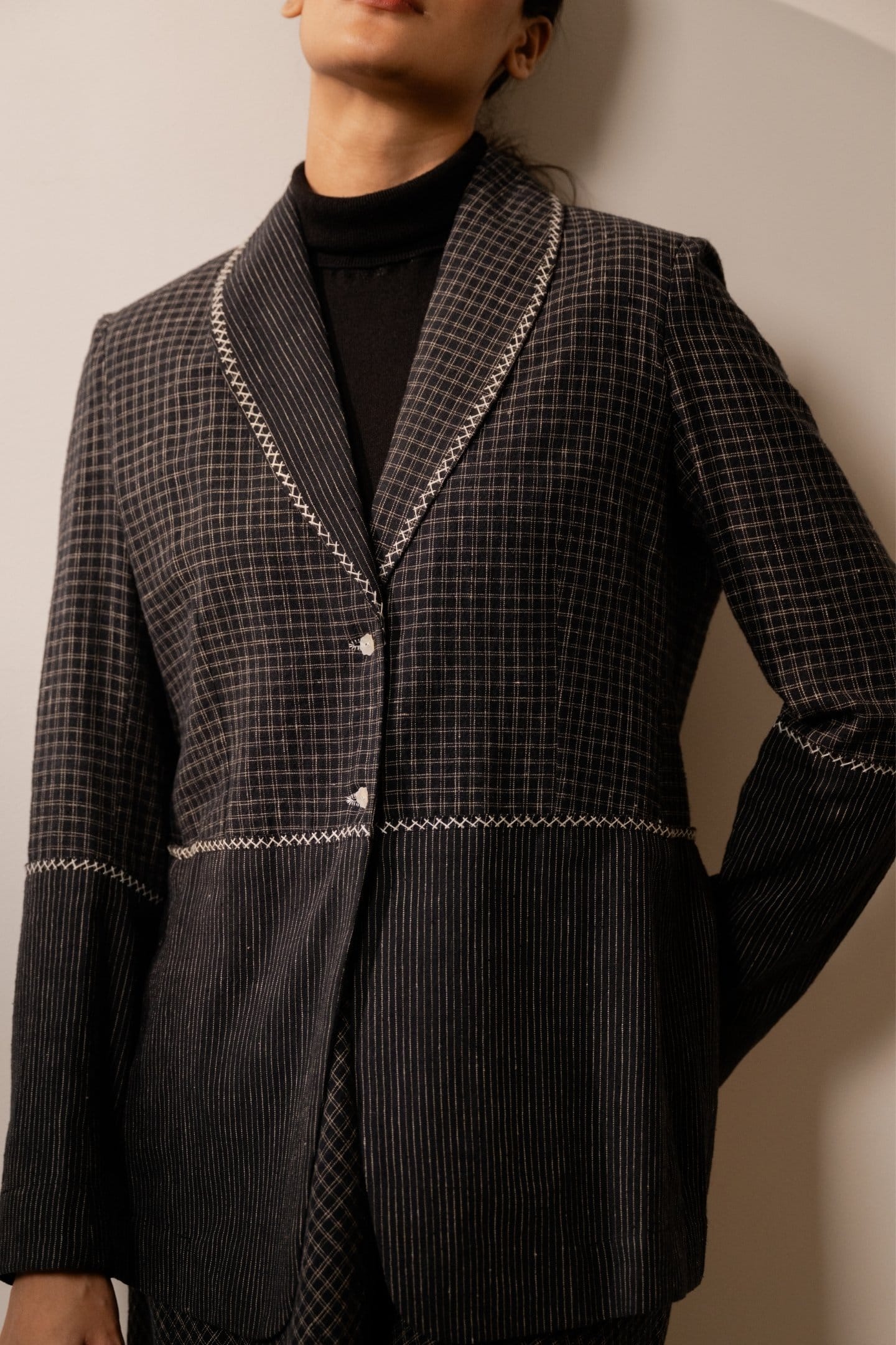 Alternative Lava Checks Blazer in black with a classic check pattern, tailored fit, and notched lapel for a stylish look.