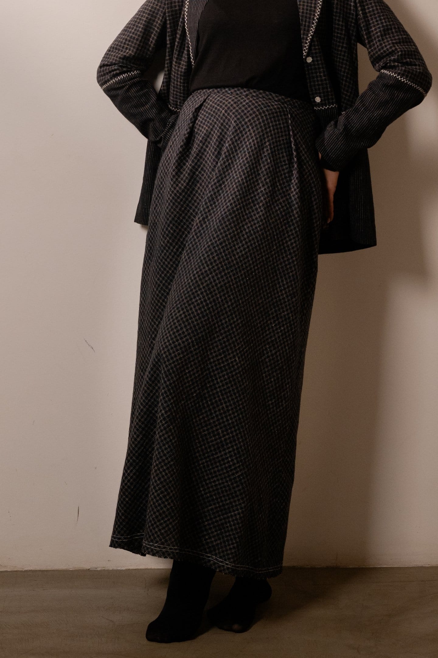 Black Lava Checks skirt by Alternative featuring a stylish checkered pattern and a flattering fit.