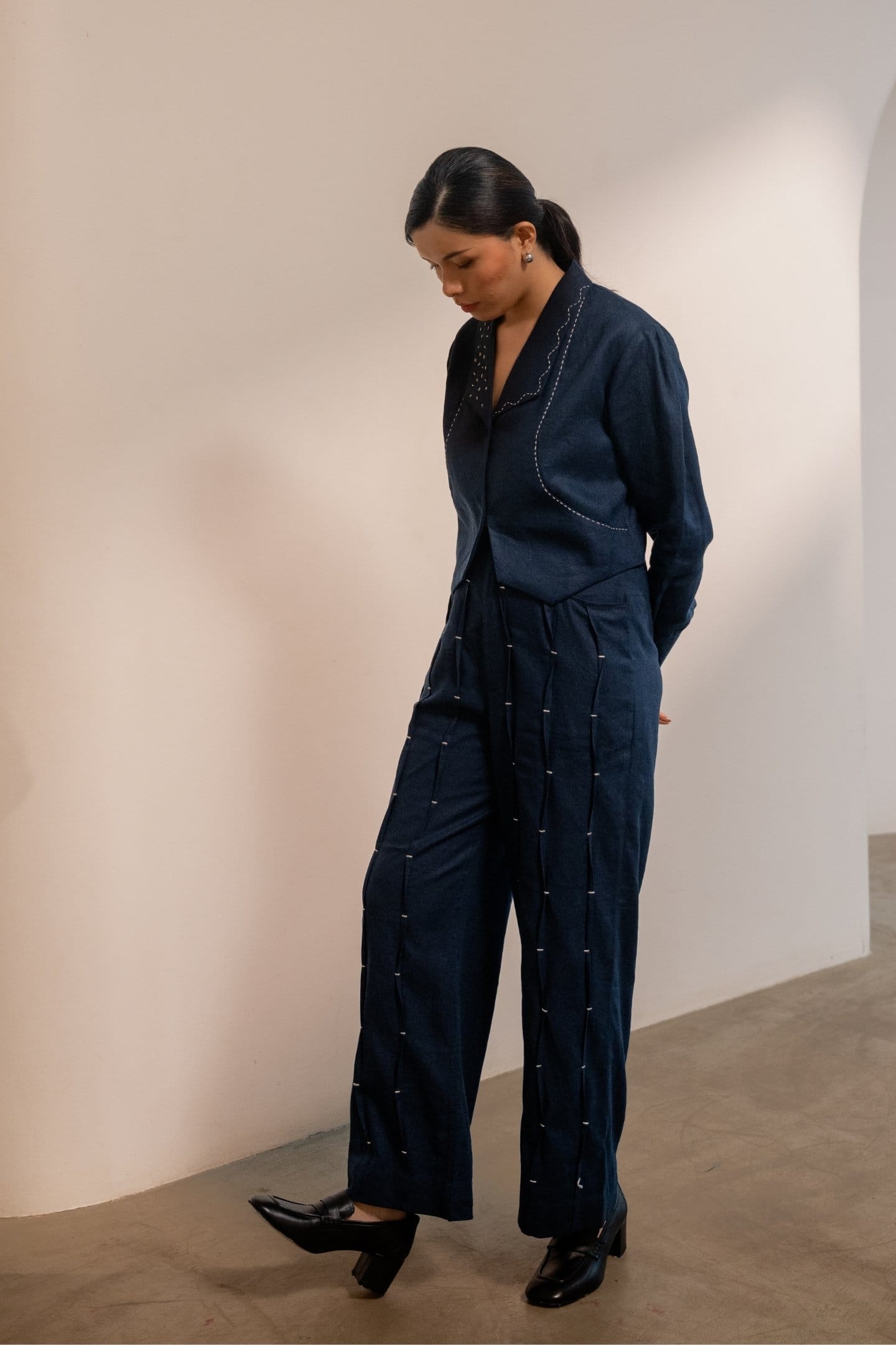 Alternative Moraine blue crop blazer jacket shown with matching pants, featuring a stylish navy blue design and tailored fit.