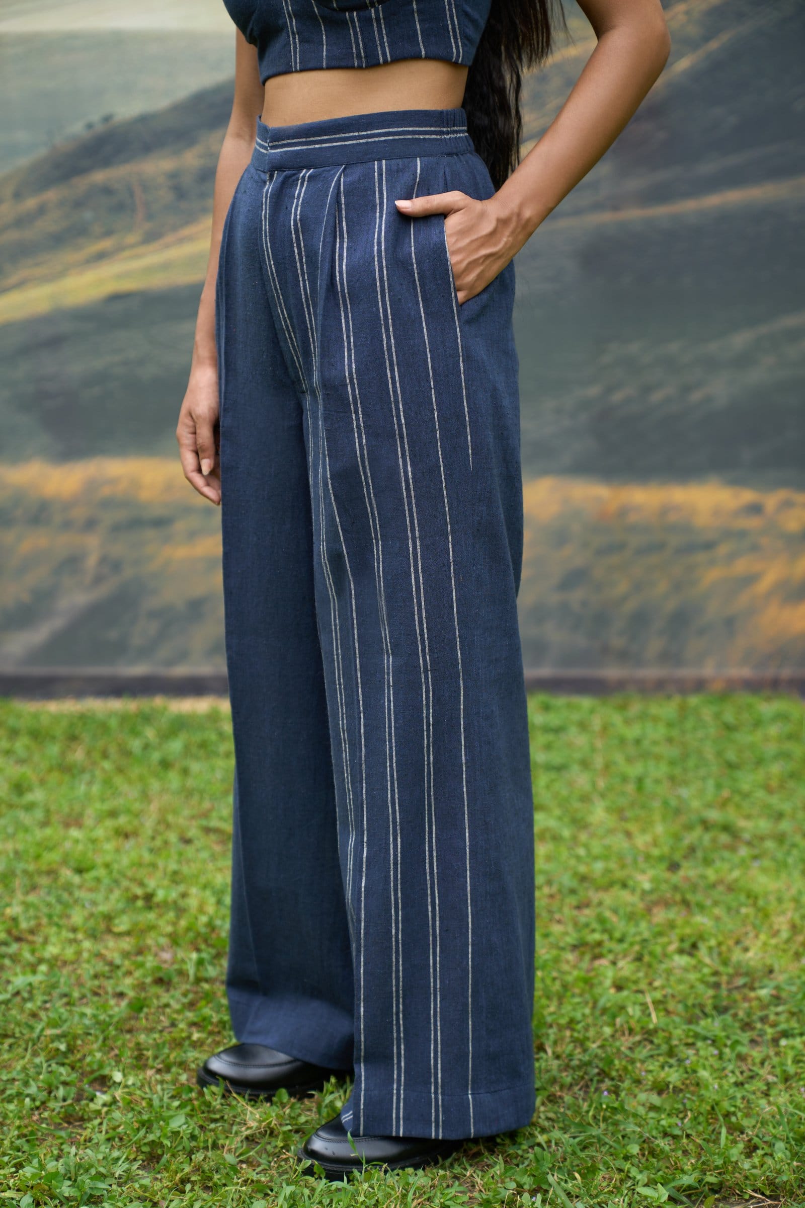 Cobalt trousers by Alternative featuring a slim fit design and modern style, shown in a close-up of the fabric and waistband.