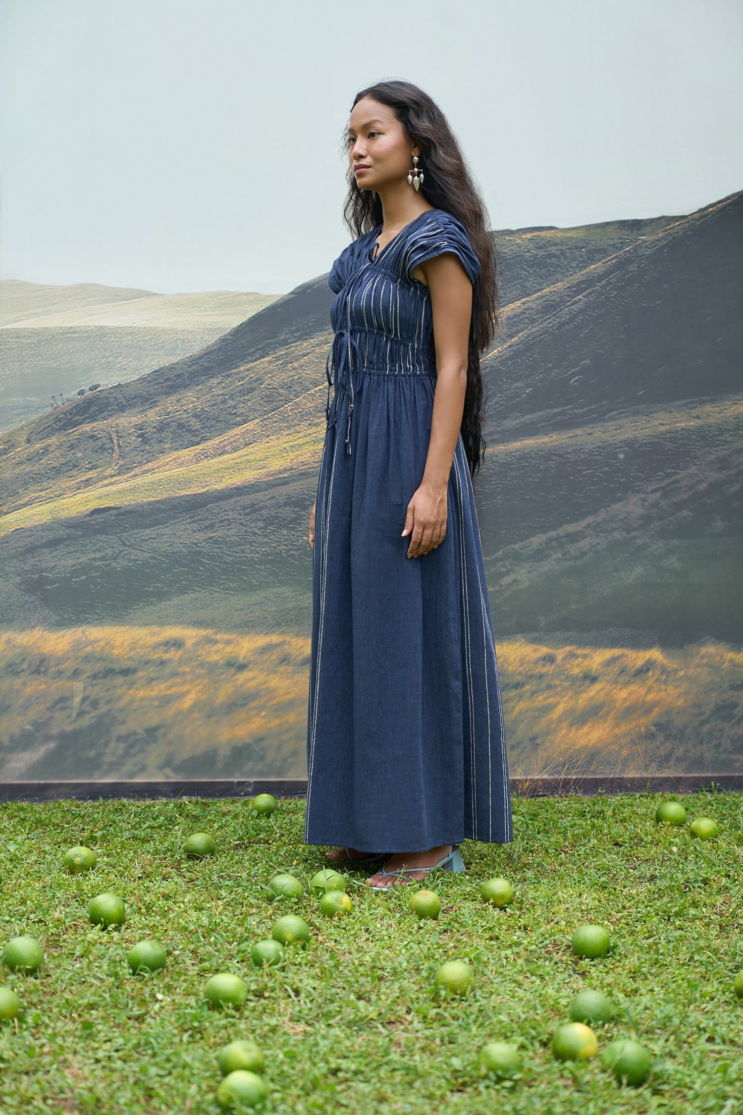 Cobalt blue maxi dress with tie-up front and sleeveless design by Alternative, showcasing a flowing, elegant style.