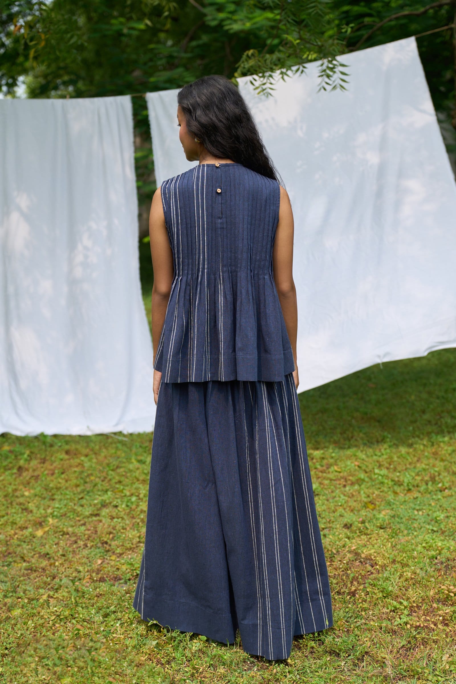 Cobalt sleeveless pintucks top and matching skirt set by Alternative, stylish coordinated outfit with a sleeveless design and pintuck details.