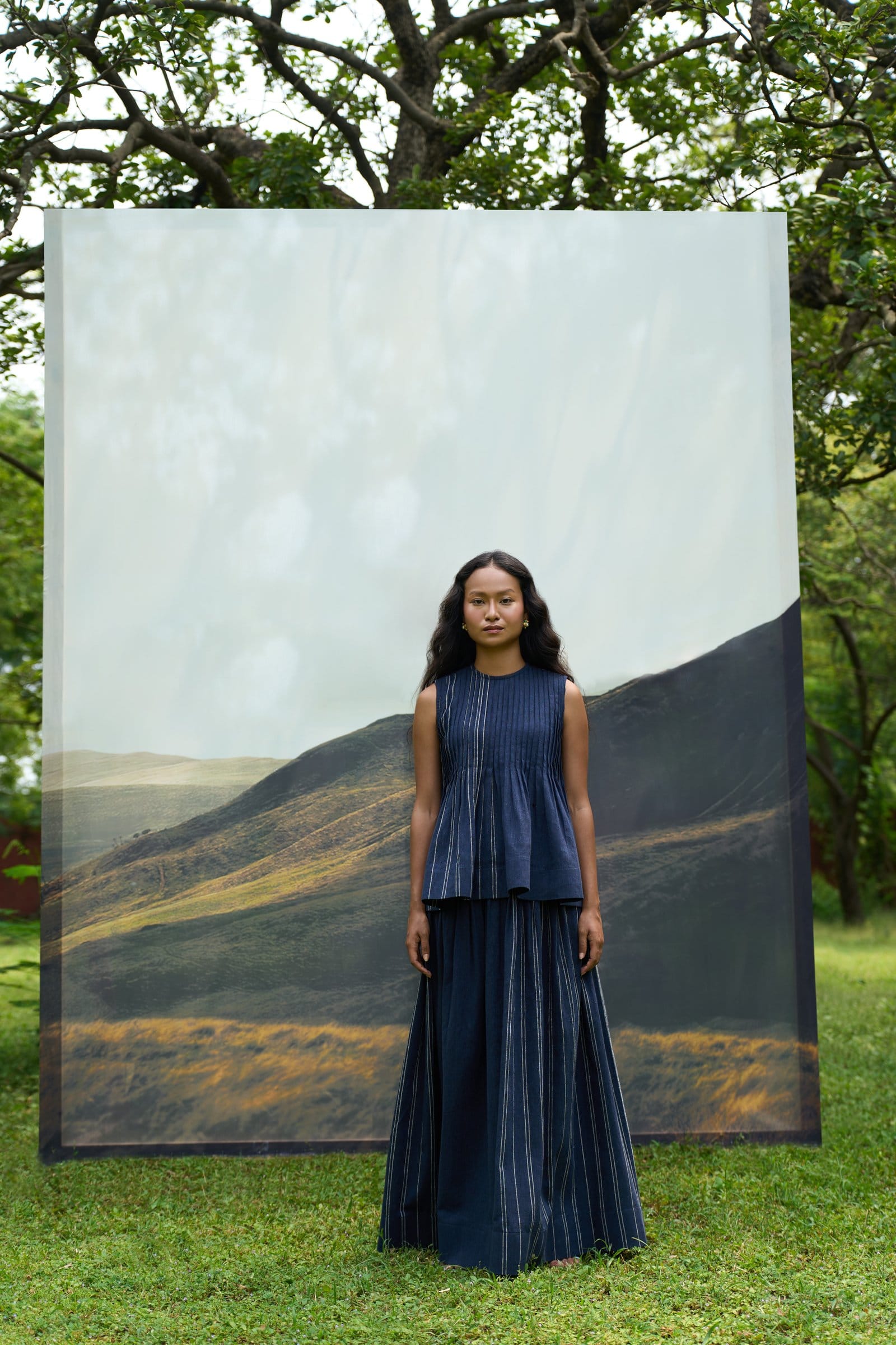 Cobalt sleeveless pintucks top by Alternative, featuring a fitted design with vertical pintuck detailing on soft fabric.