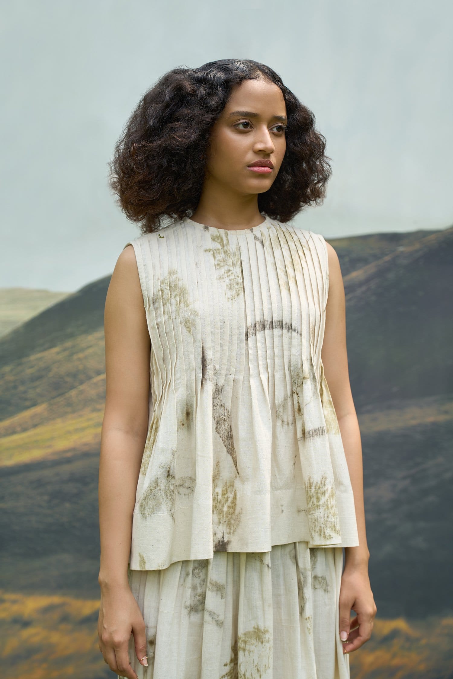 Alternative Live Leafy Skirt showing a flowing, leafy-patterned skirt with vibrant green and natural tones.