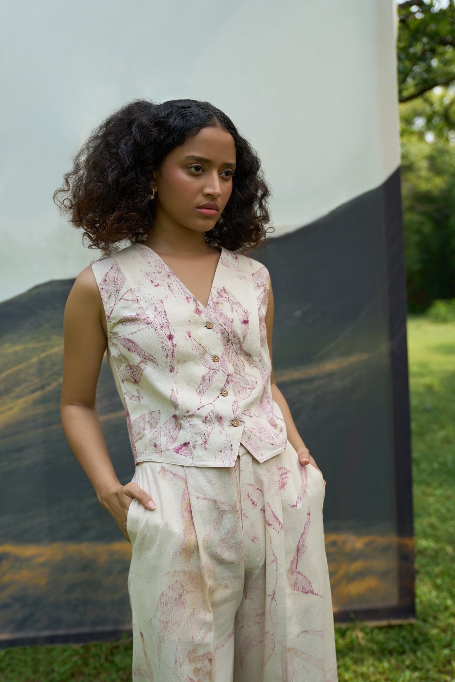 Pink foliage blazer and trousers set by Alternative, featuring a floral pattern, tailored fit, and stylish coordinating outfit.