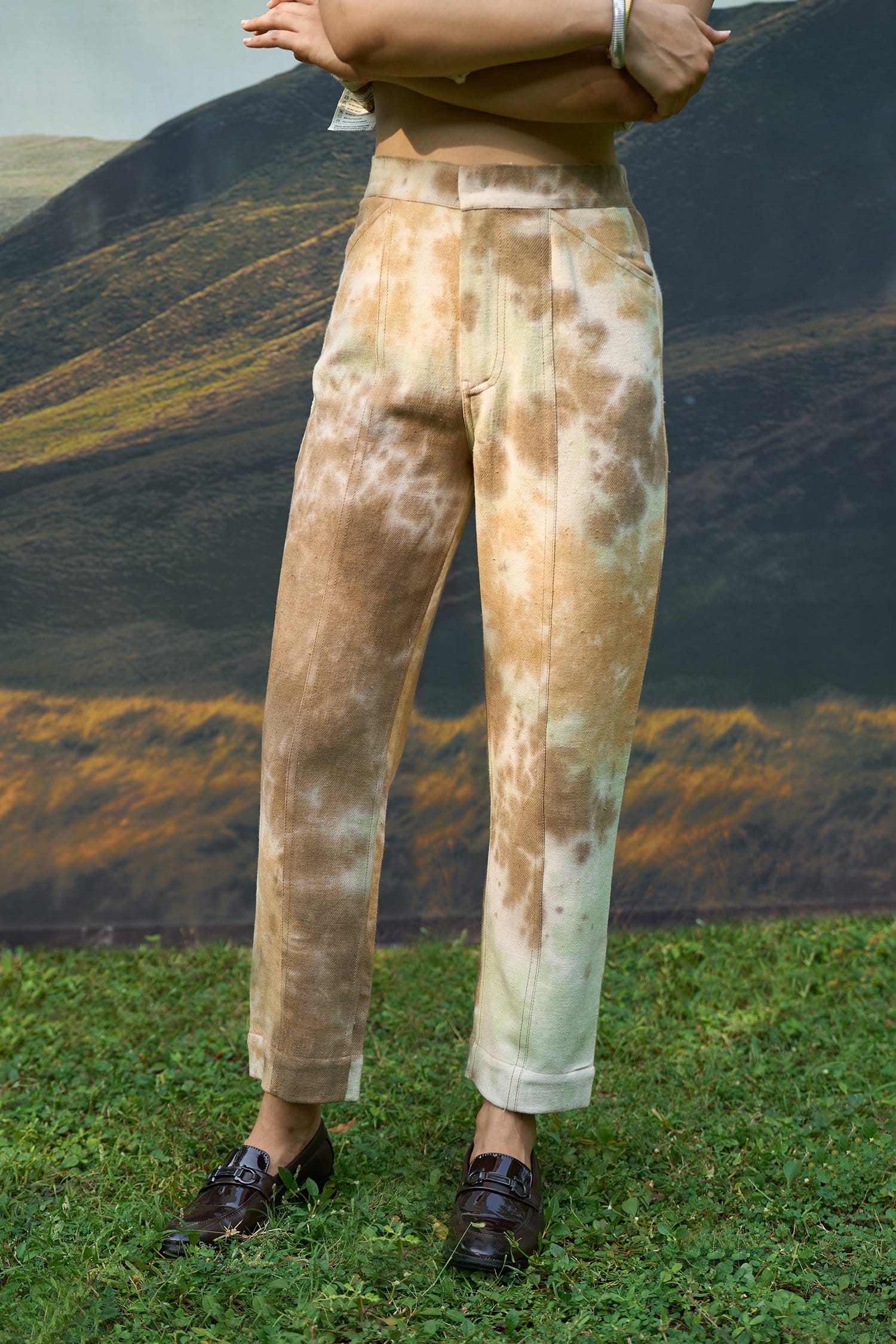 Alternative Forest denim trousers showing classic blue jeans style with visible stitching and five-pocket design.