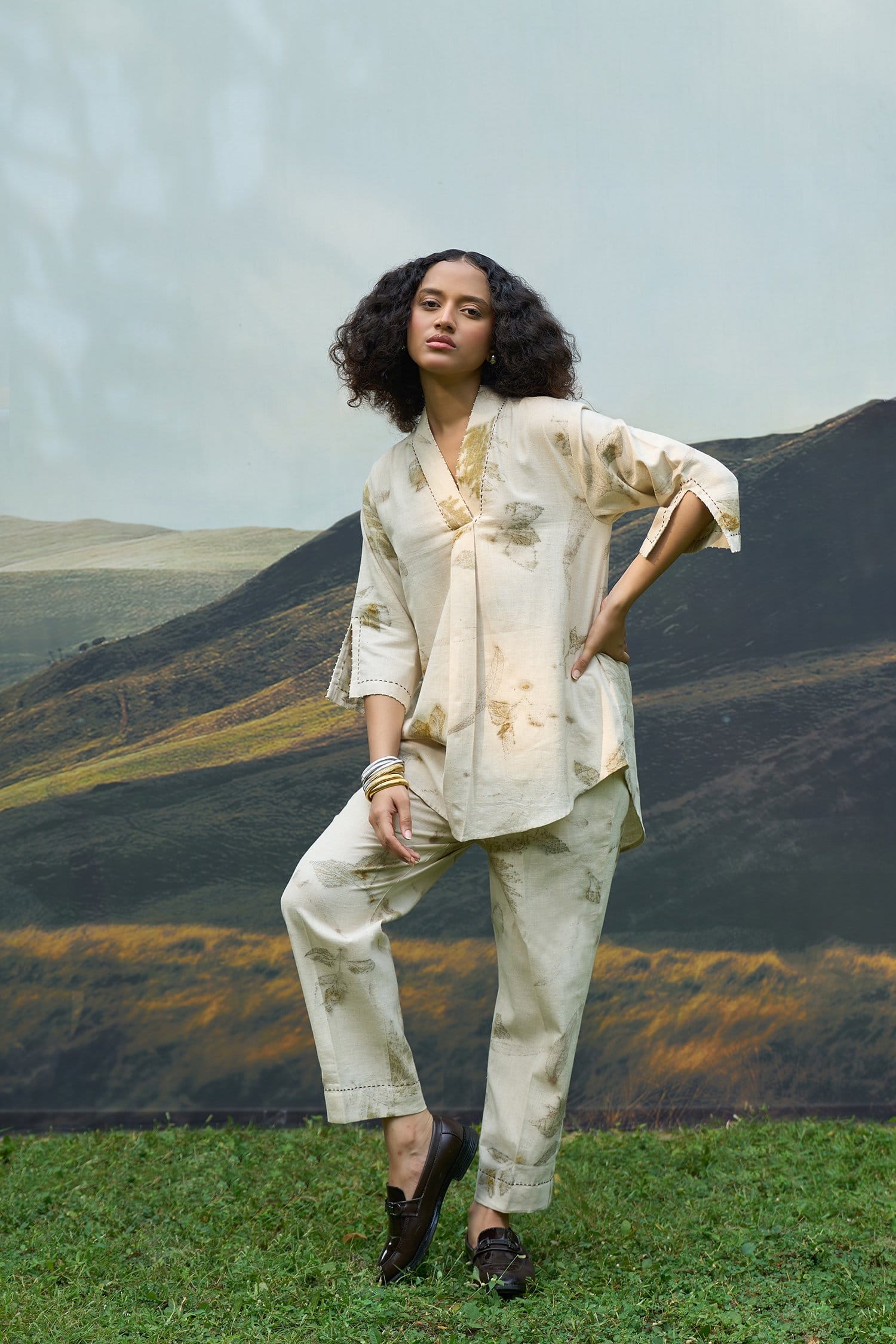 Alternative Live leafy kurta, a stylish leafy patterned top with a relaxed fit and vibrant green tones.