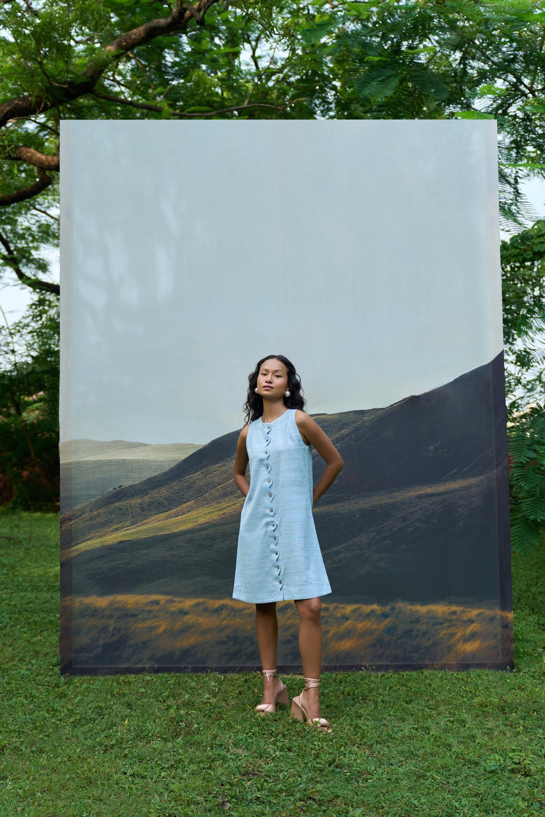 Alternative Petal sleeveless short dress with a floral pattern, featuring a fitted bodice and flowing skirt for a stylish look.