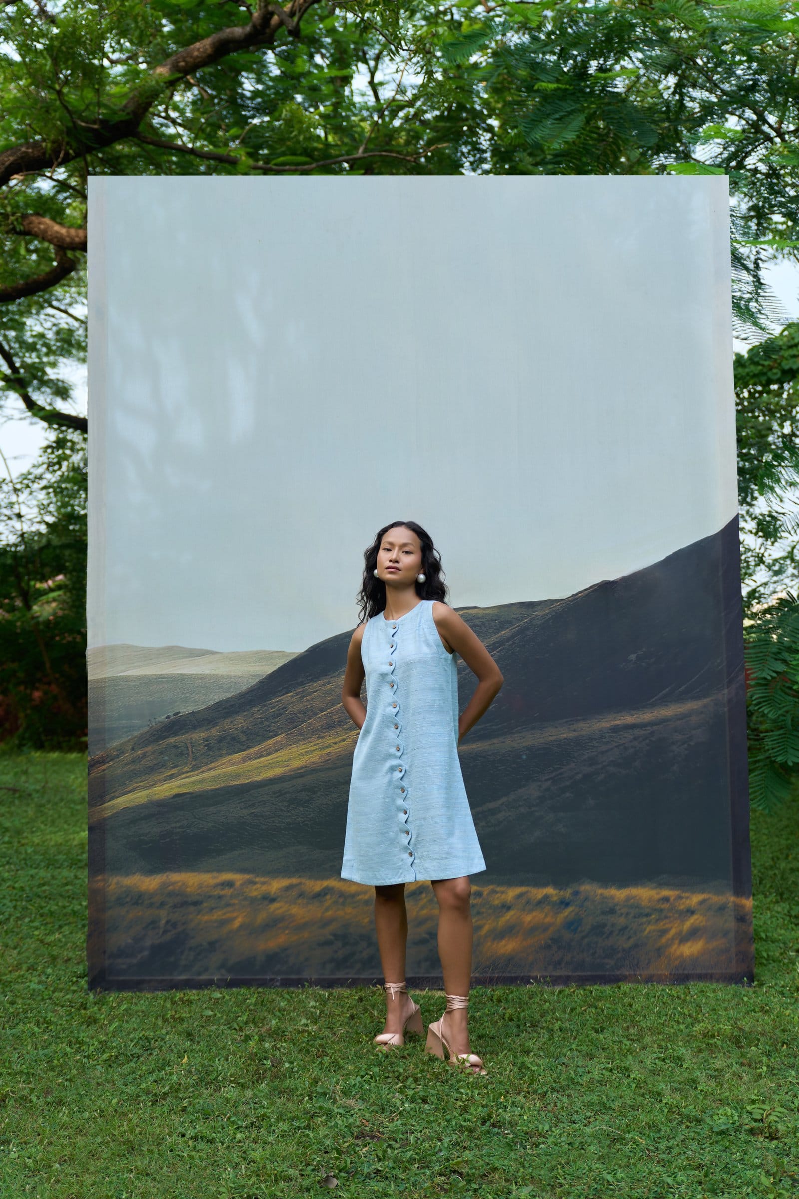Alternative Petal sleeveless short dress with a floral pattern, featuring a fitted bodice and flowing skirt for a stylish look.