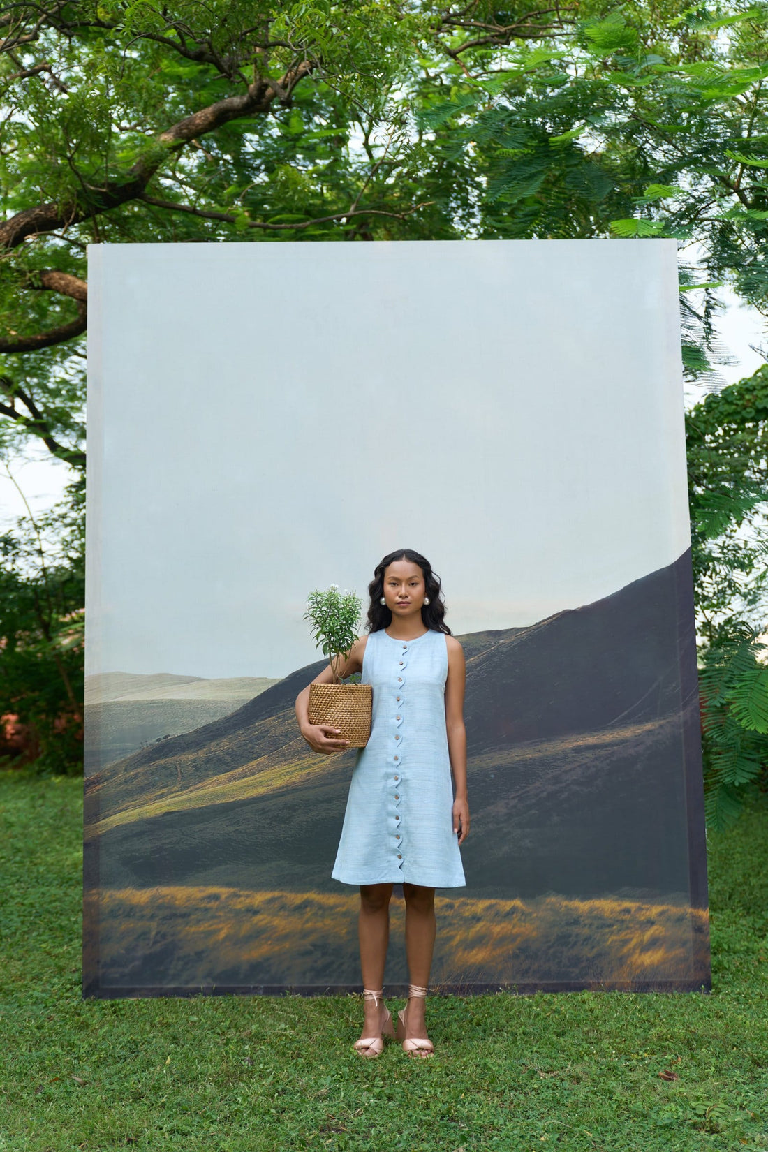 Alternative Petal sleeveless short dress with a floral pattern, featuring a fitted bodice and flowing skirt for a stylish look.