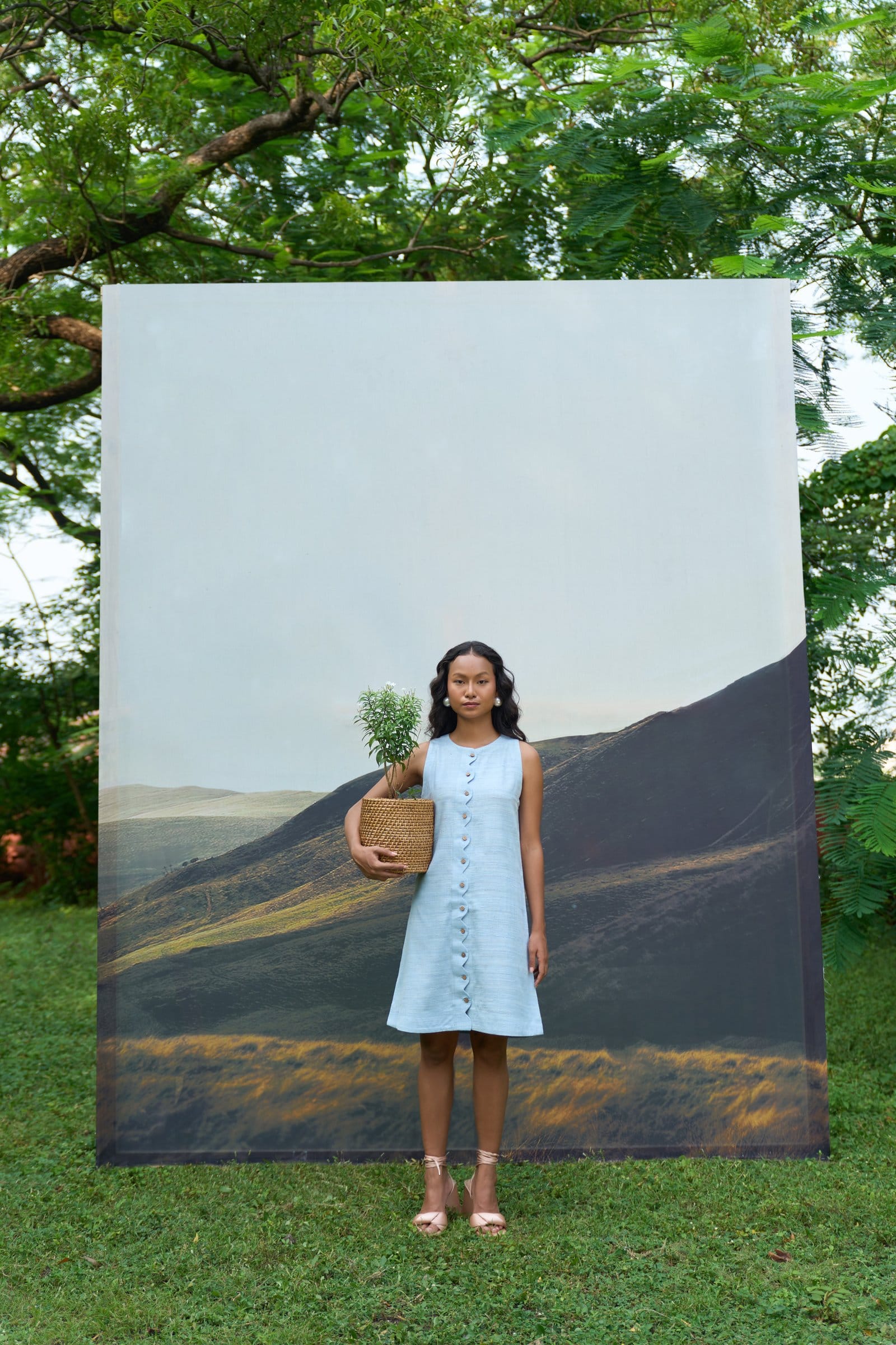 Alternative Petal sleeveless short dress shown on a model, lightweight and flowy summer dress with floral pattern.