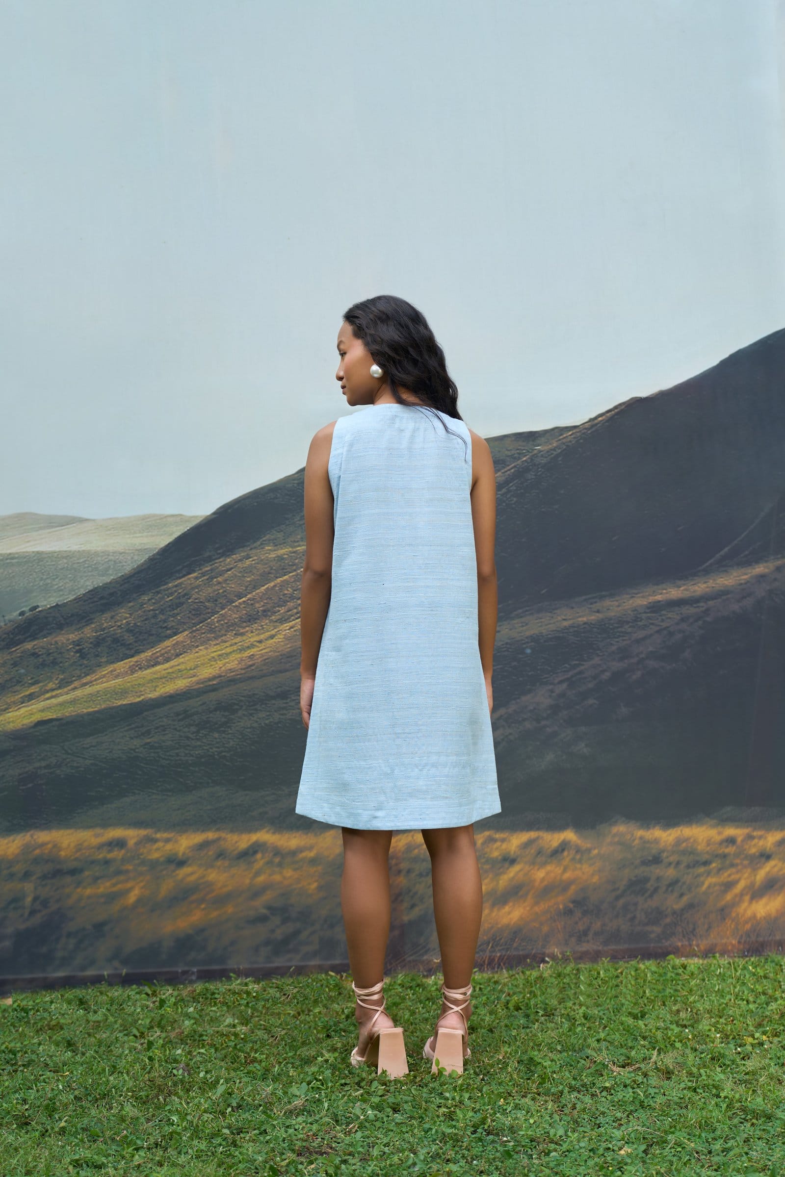 Alternative Petal sleeveless short dress with floral pattern, lightweight fabric, and comfortable fit for casual wear.